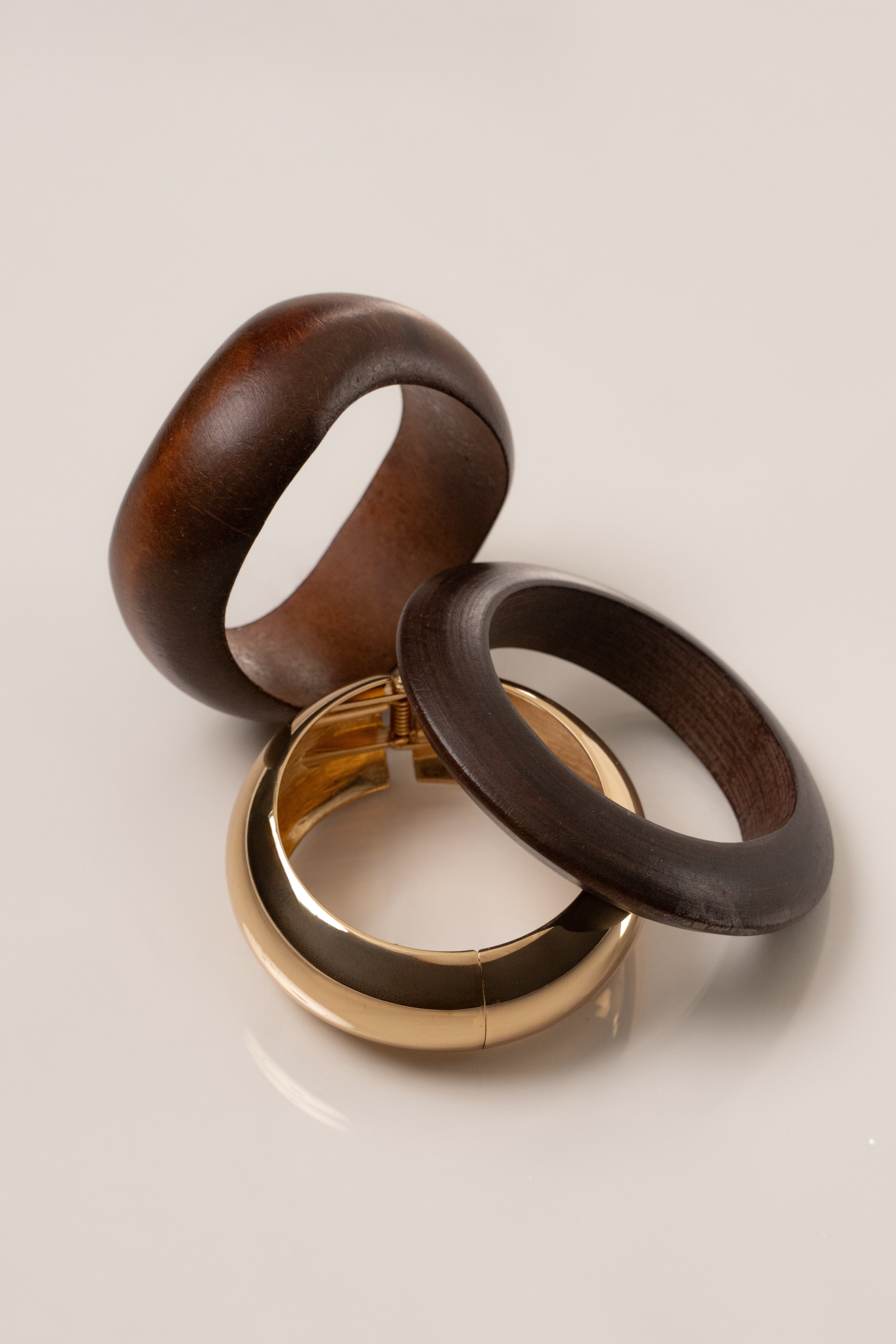 Gold Kora bracelet set by JLUXLABEL featuring elegant jewelry with multiple gold-toned bangles and intricate designs.