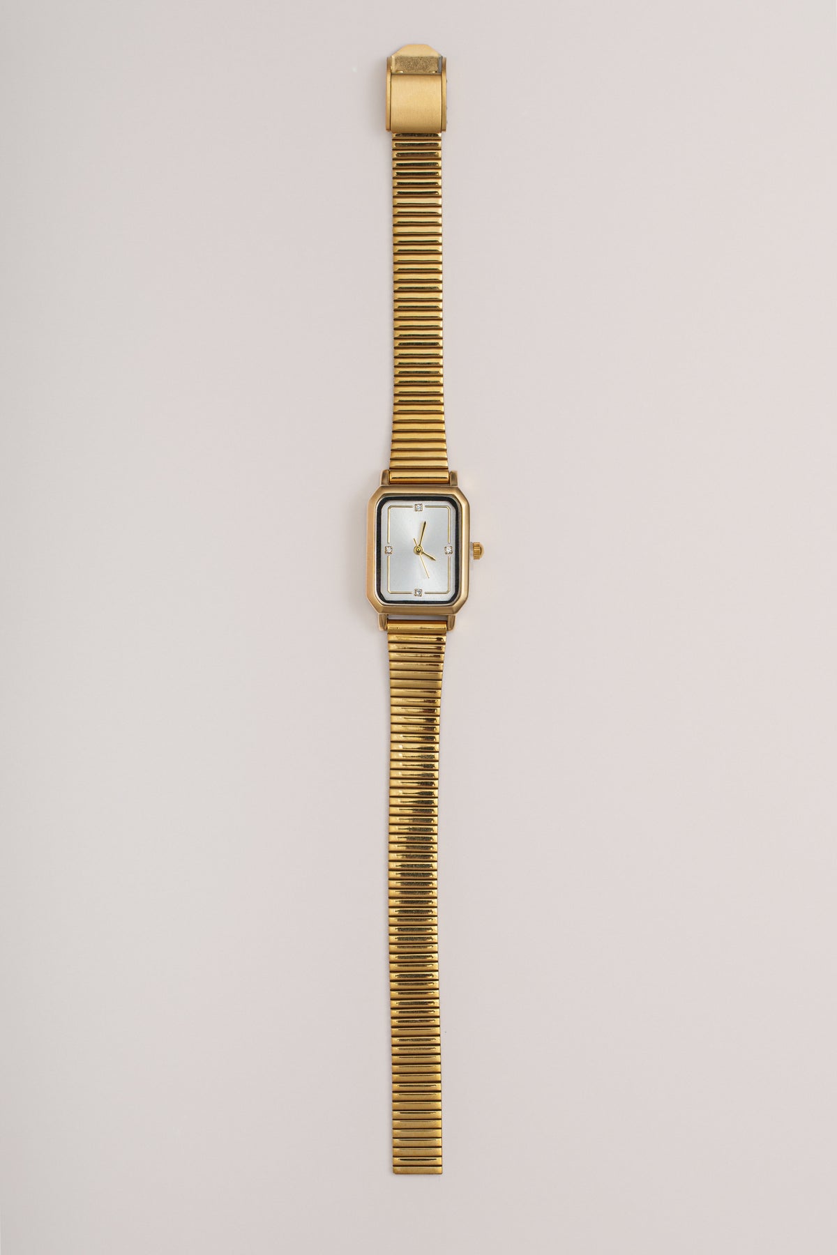 Gold London Watch jewelry by JLUXLABEL featuring a sleek gold-toned design and elegant watch face with minimalistic style.