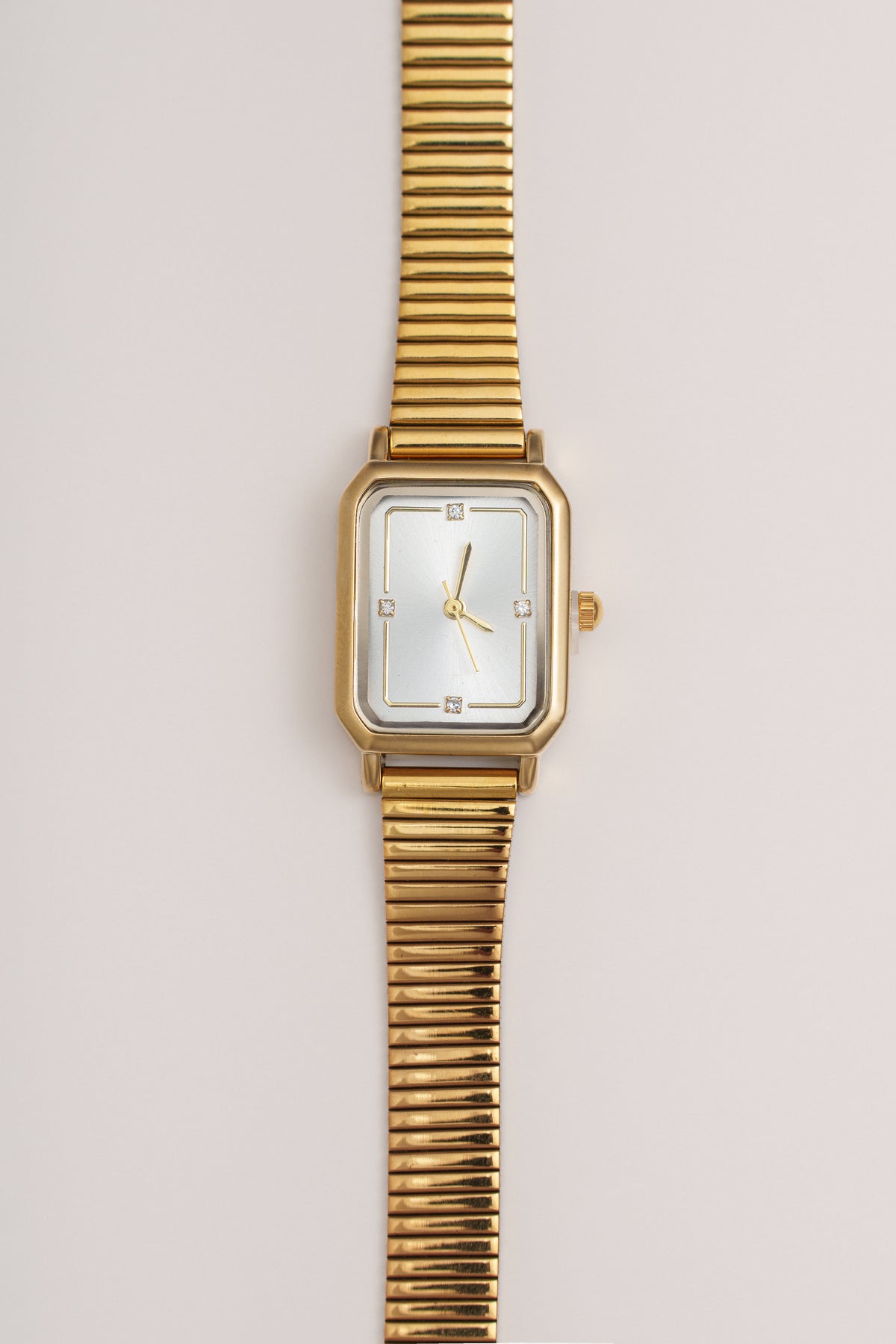 Gold London watch by JLUXLABEL featuring a sleek round face and elegant jewelry-style band, perfect for stylish accessories.