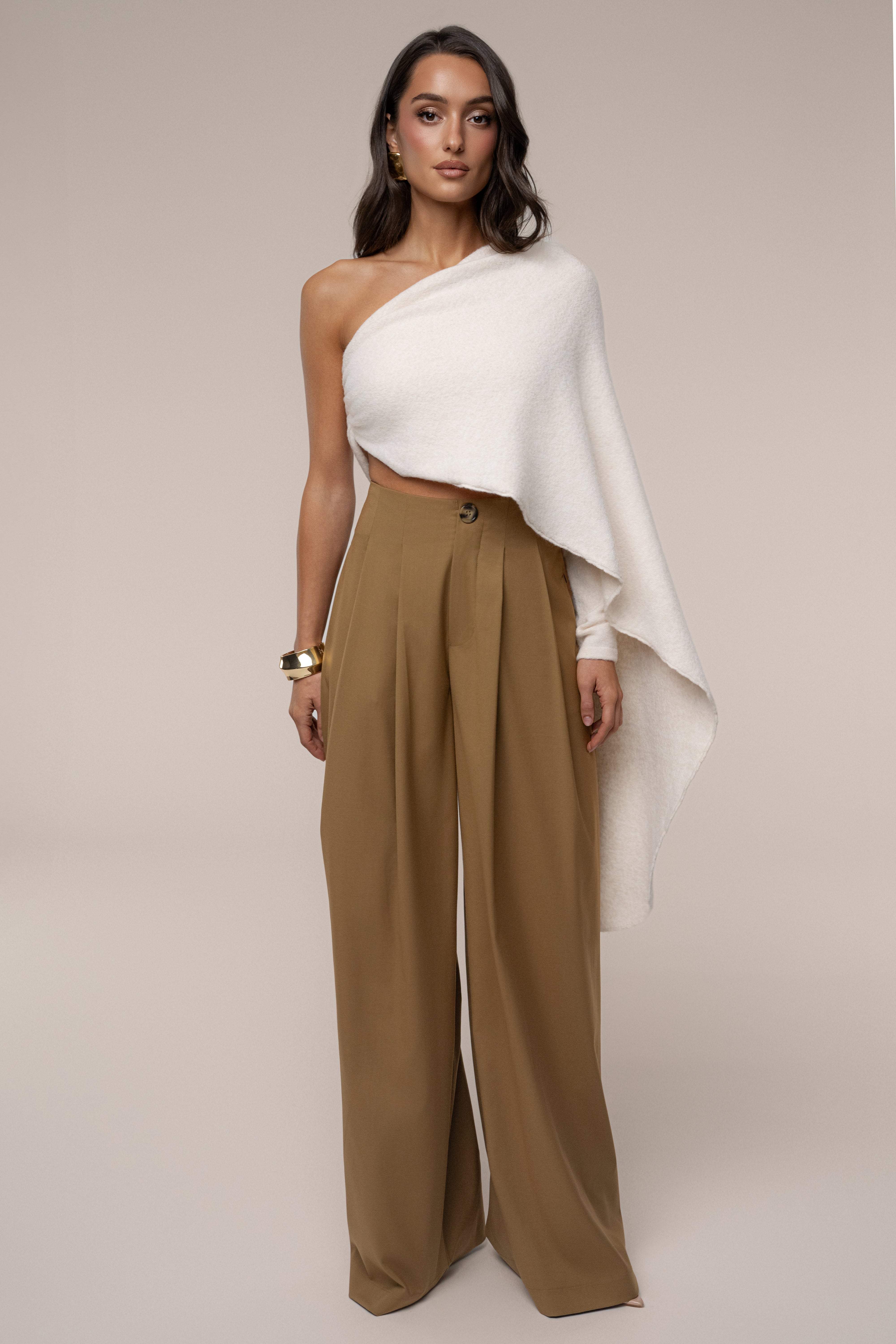 Ivory capsule one shoulder top from JLUXLABEL, featuring a stylish single-shoulder design and sleek fabric for a chic look.