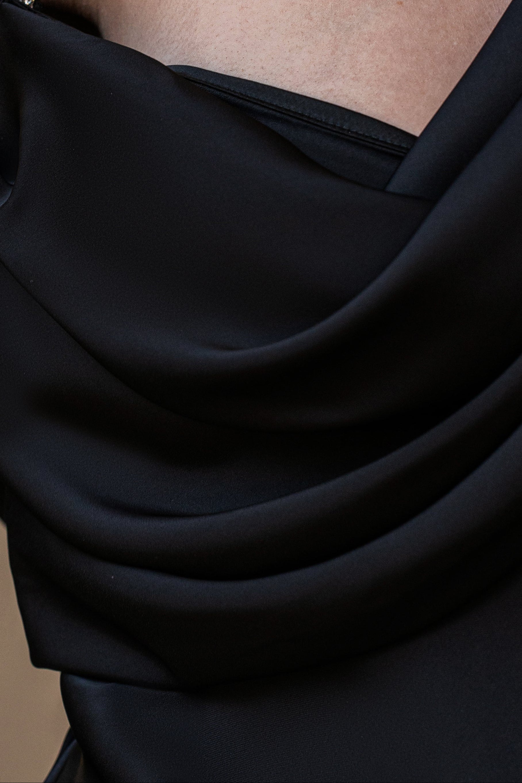 Black satin dress by JLUXLABEL, featuring elegant one-shoulder design and smooth fabric, perfect for formal occasions.