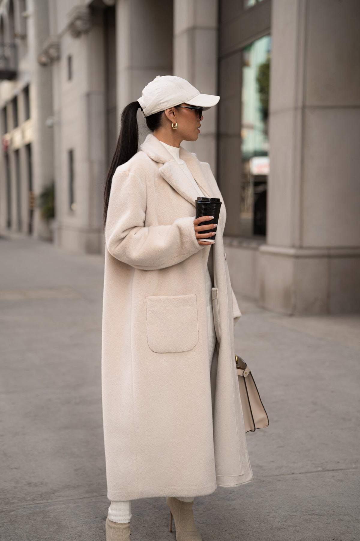 Beige Thelma reversible suede coat by JLUXLABEL, showing front view with collar and sleeve details, stylish outerwear for cold weather.