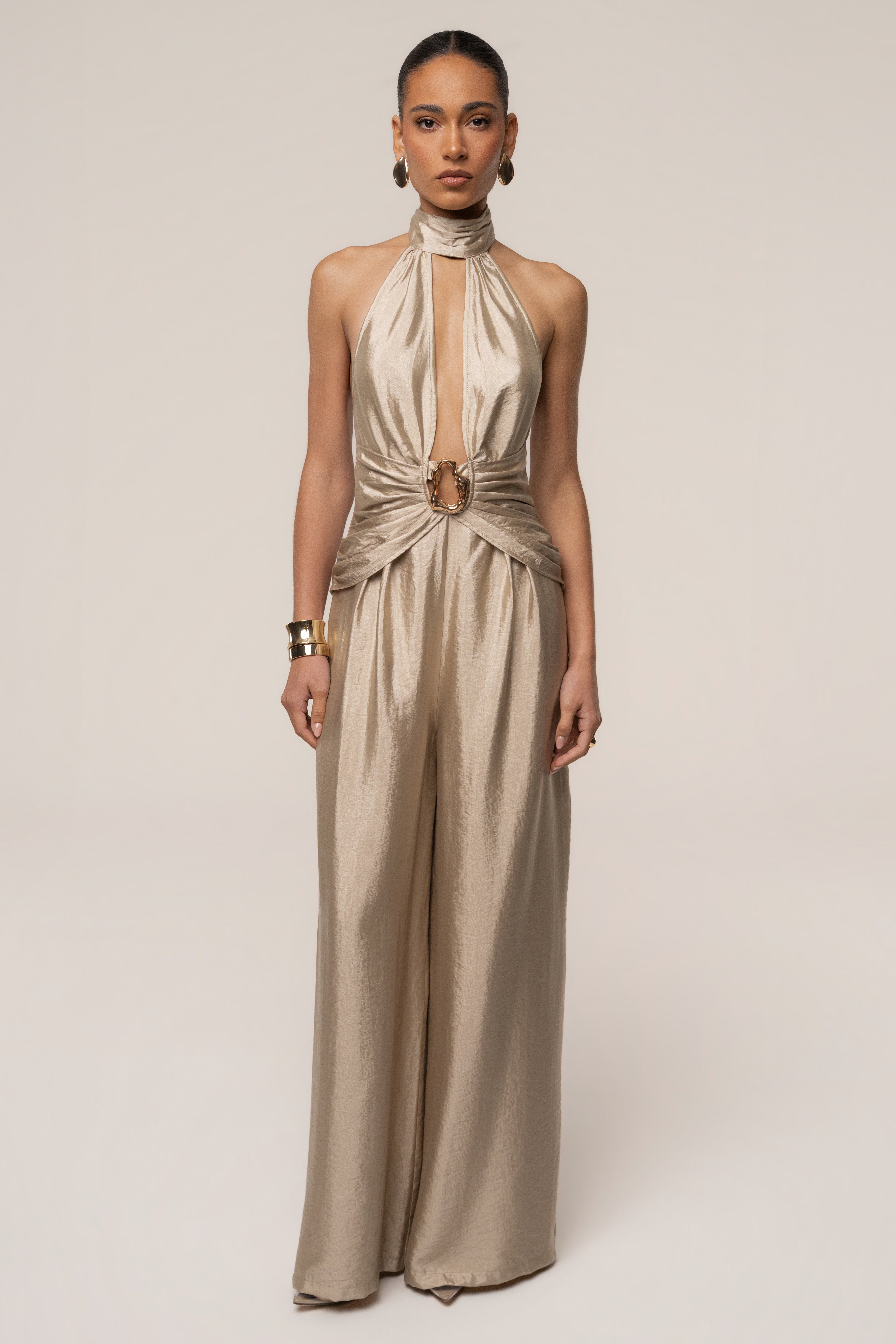 Gold accent jumpsuit by JLUXLABEL featuring a stylish, fitted design with elegant gold detailing on the jumpsuit.