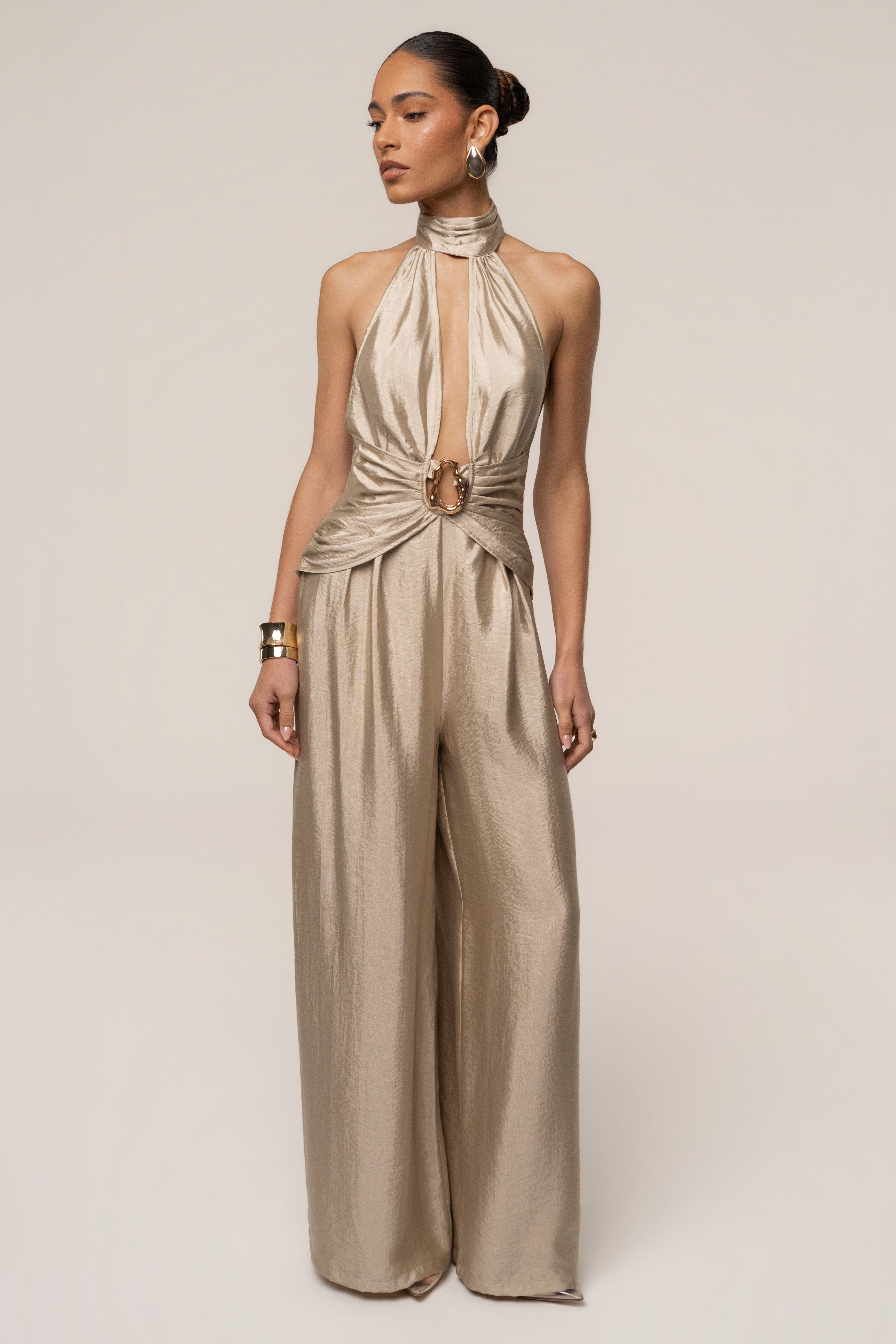 Gold accent JLUXLABEL jumpsuit with stylish design, featuring a fitted silhouette and elegant details, perfect for chic occasions.
