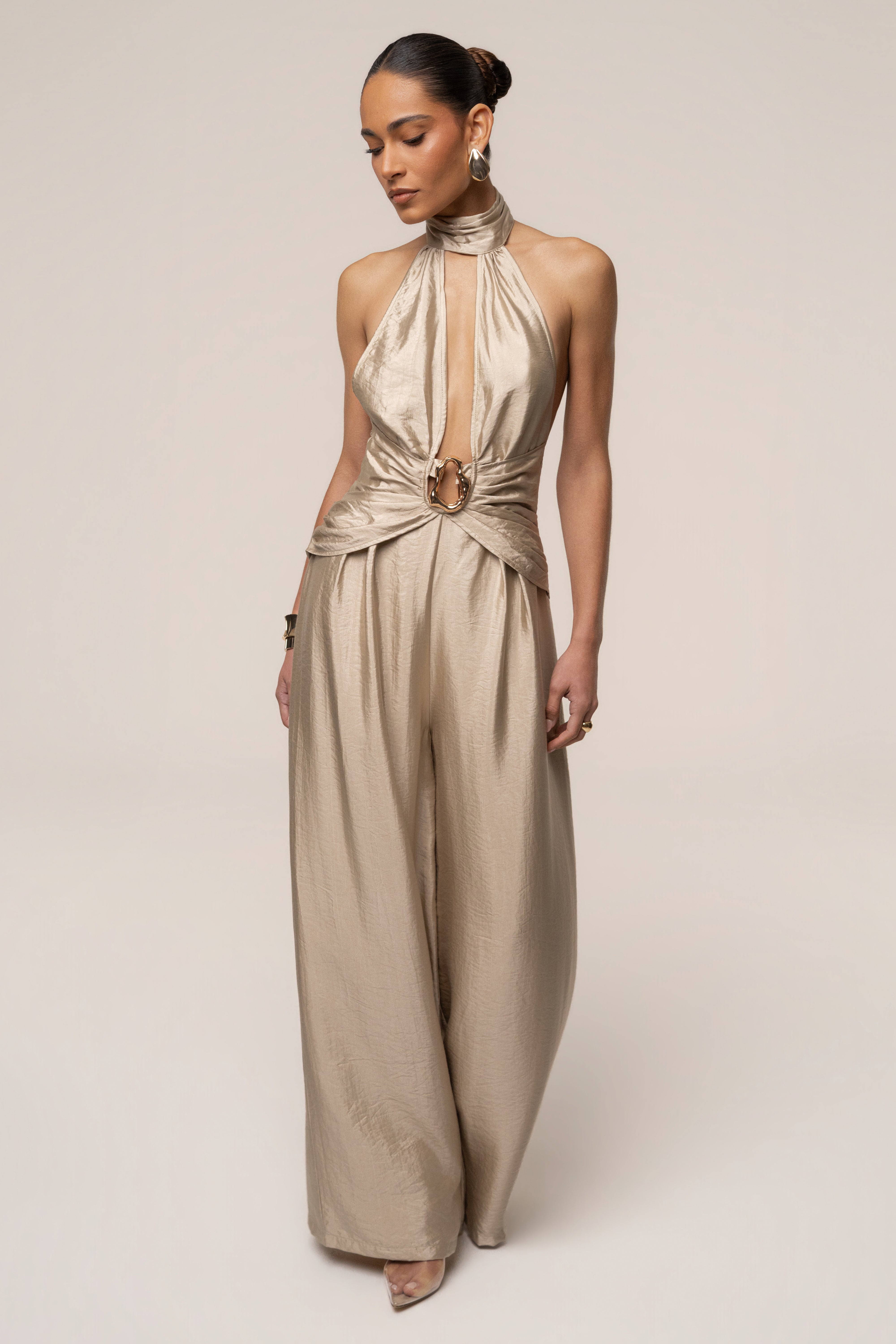 Gold accent JLUXLABEL jumpsuit featuring a stylish design with a sleek fit and elegant details.