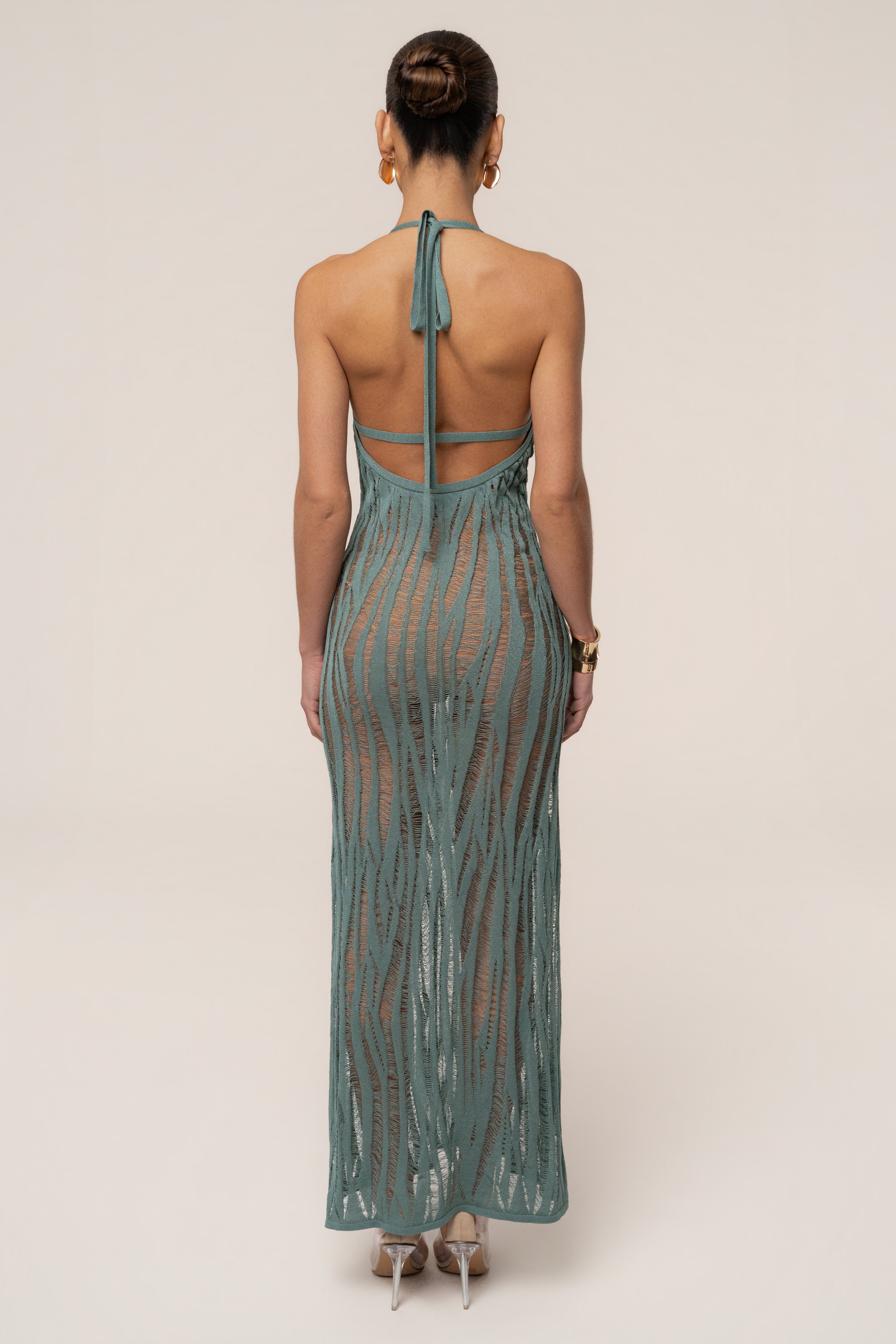 Dusty green Nocturnal Waves maxi dress by JLUXLABEL featuring flowing fabric and a stylish silhouette.