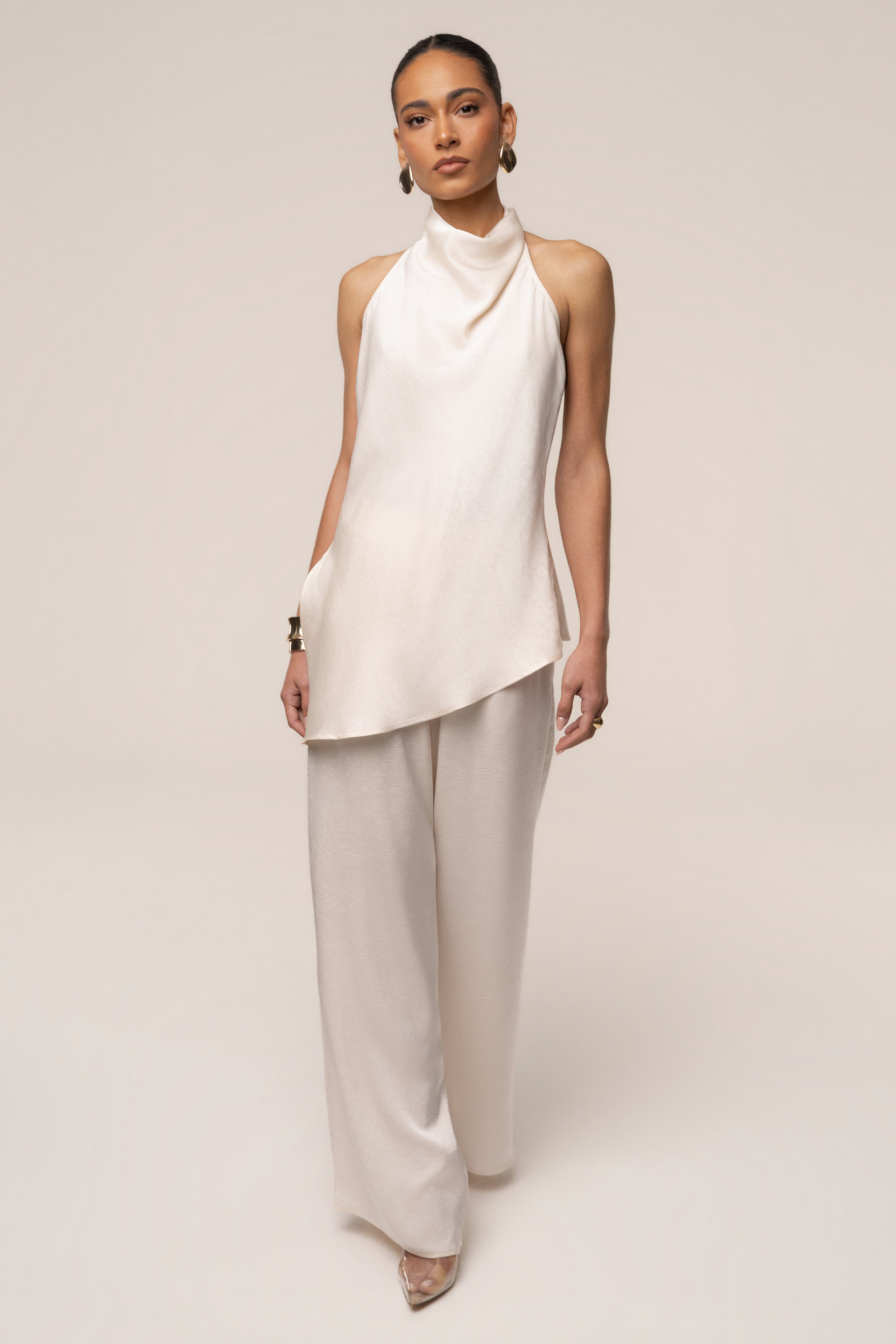 Cream satin pant set with draped design by JLUXLABEL, featuring a stylish, elegant fit and smooth fabric.