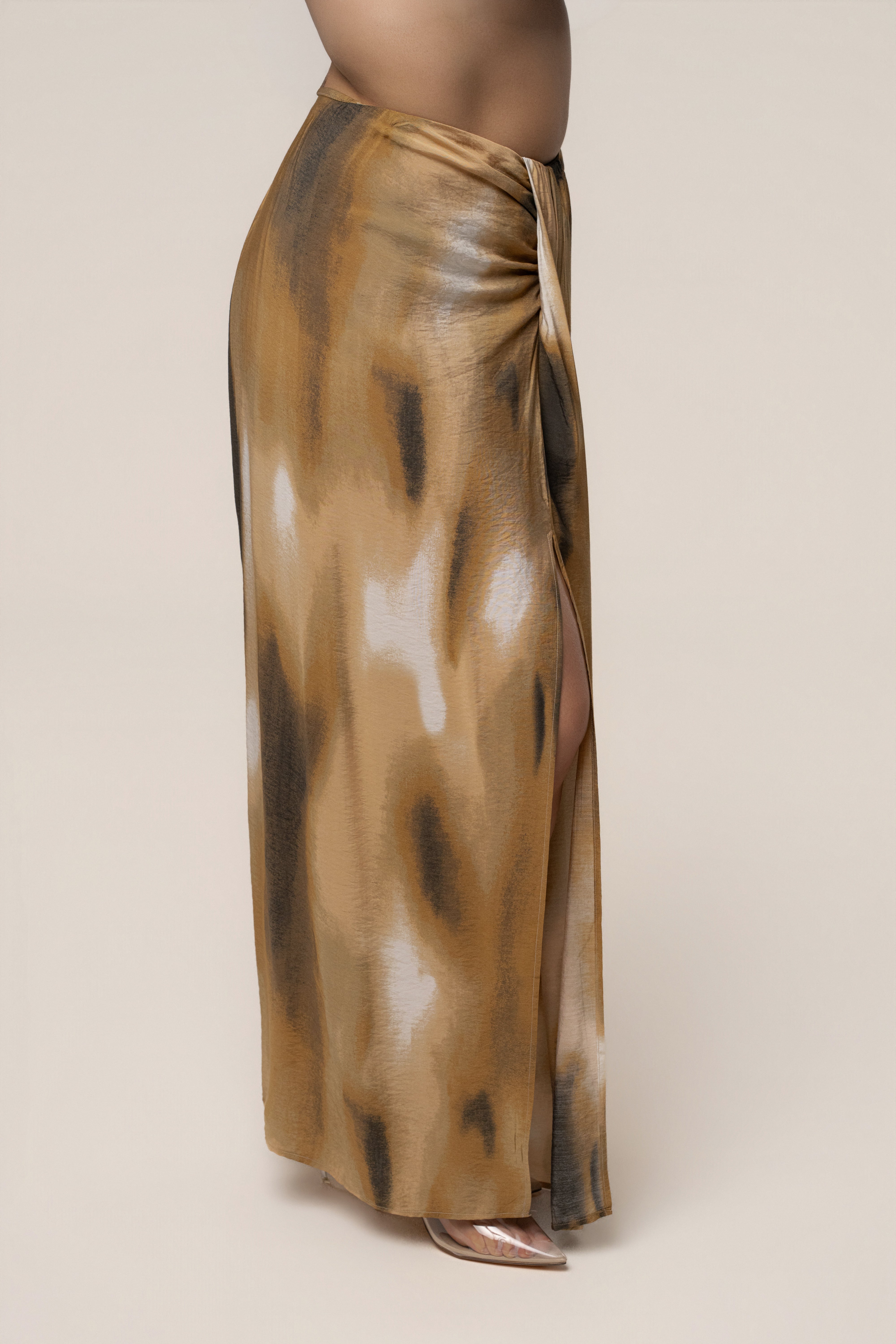 Brown flowing maxi skirt from JLUXLABEL, lightweight and elegant with a loose, draped design, perfect for stylish bottoms.