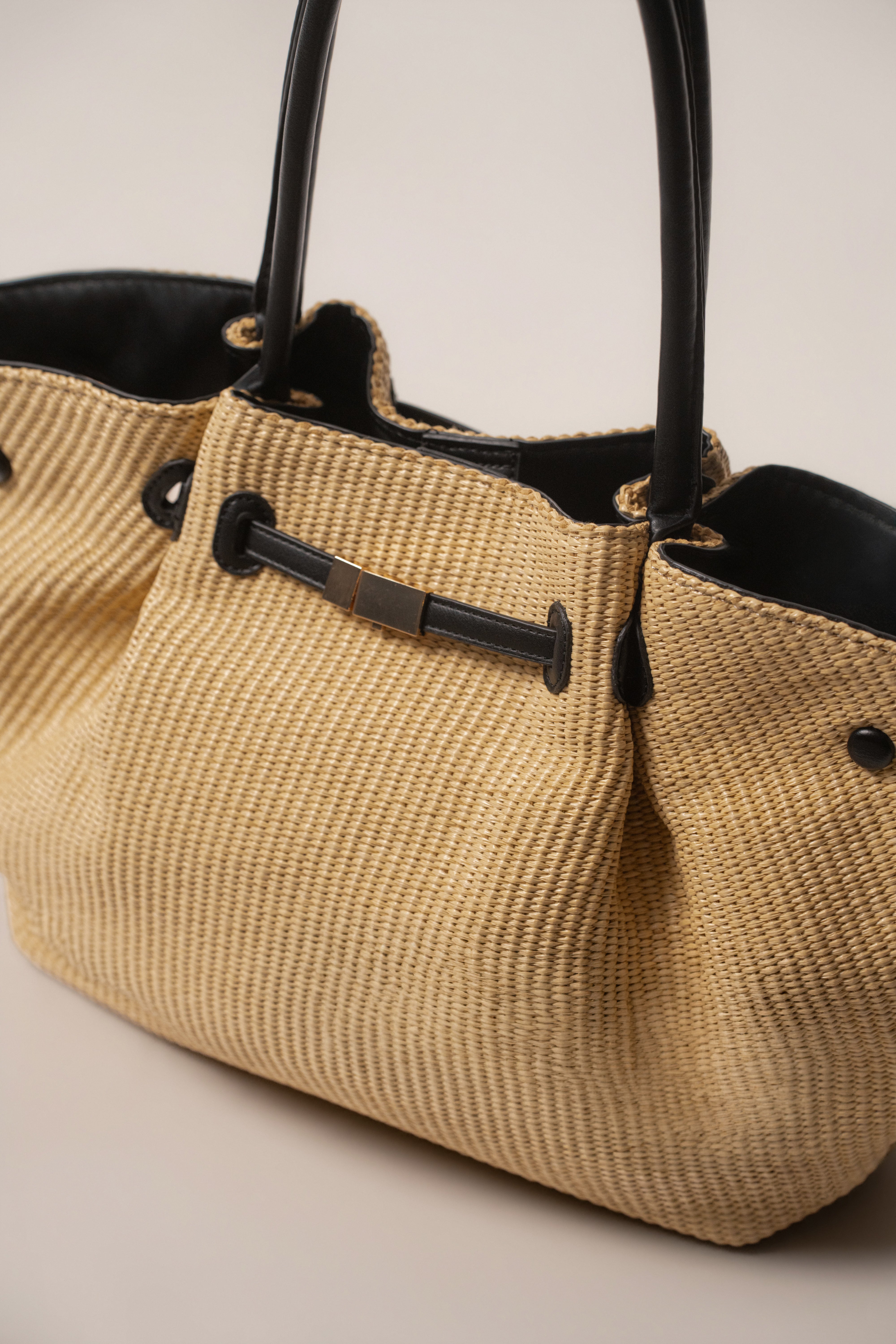 Natural Lana woven handbag by JLUXLABEL, featuring a stylish, handcrafted accessory with intricate woven details and a natural finish.