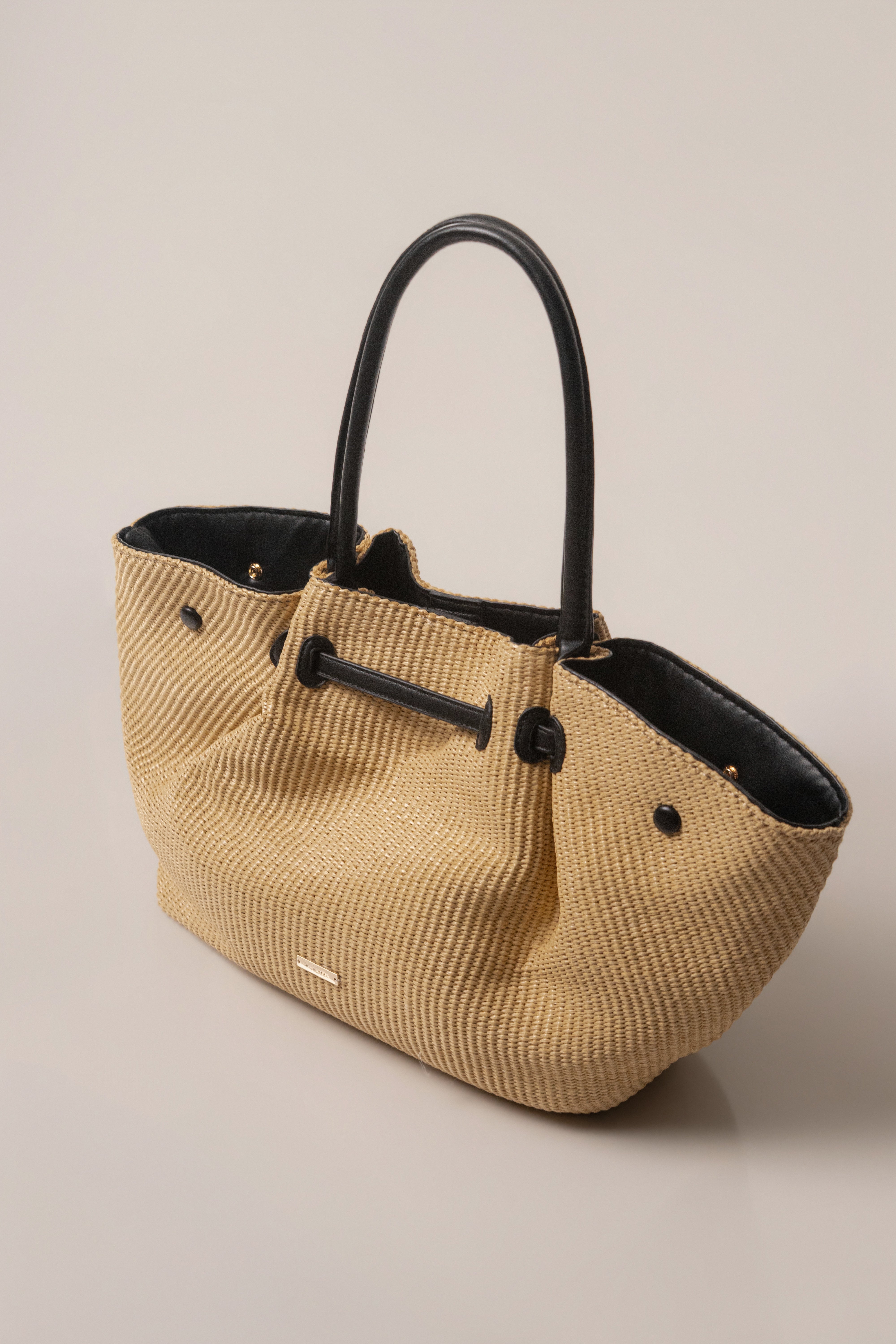 Natural Lana woven handbag by JLUXLABEL, showcasing a stylish, handcrafted accessory with intricate woven details.