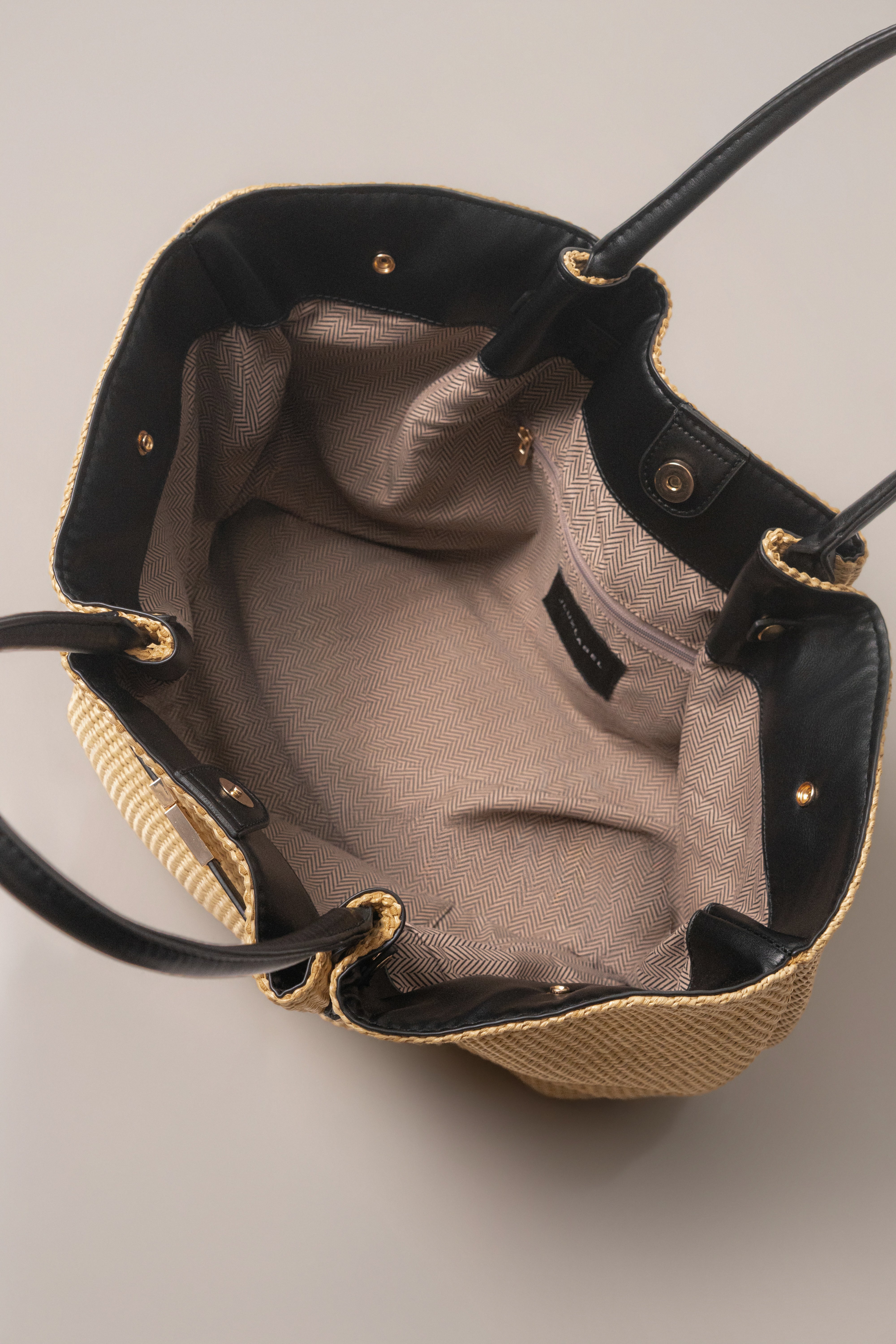 Natural Lana woven handbag by JLUXLABEL, showcasing a stylish accessory with intricate woven design and natural fibers.