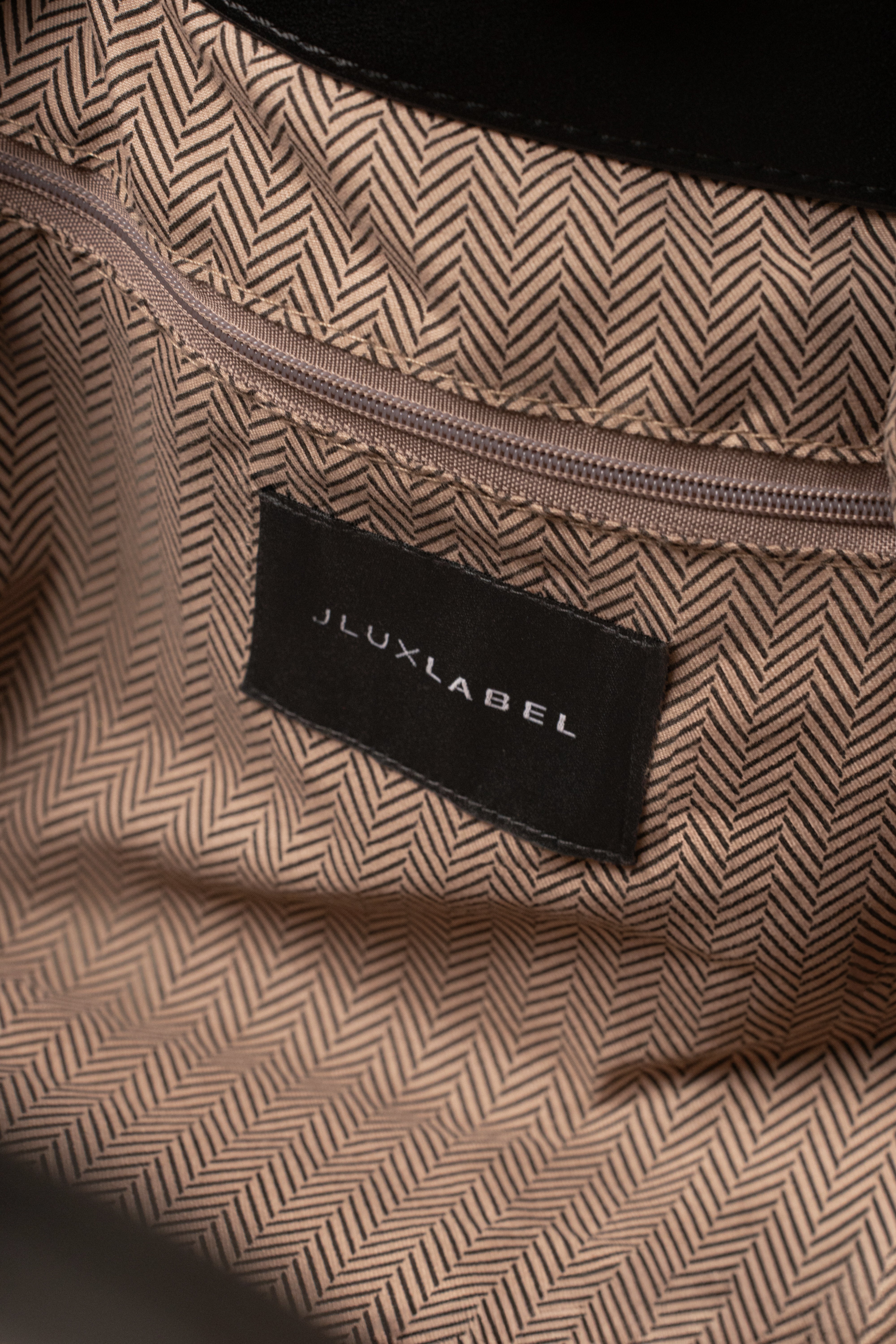 Natural Lana woven handbag by JLUXLABEL, stylish accessory with intricate woven texture and natural fiber design.
