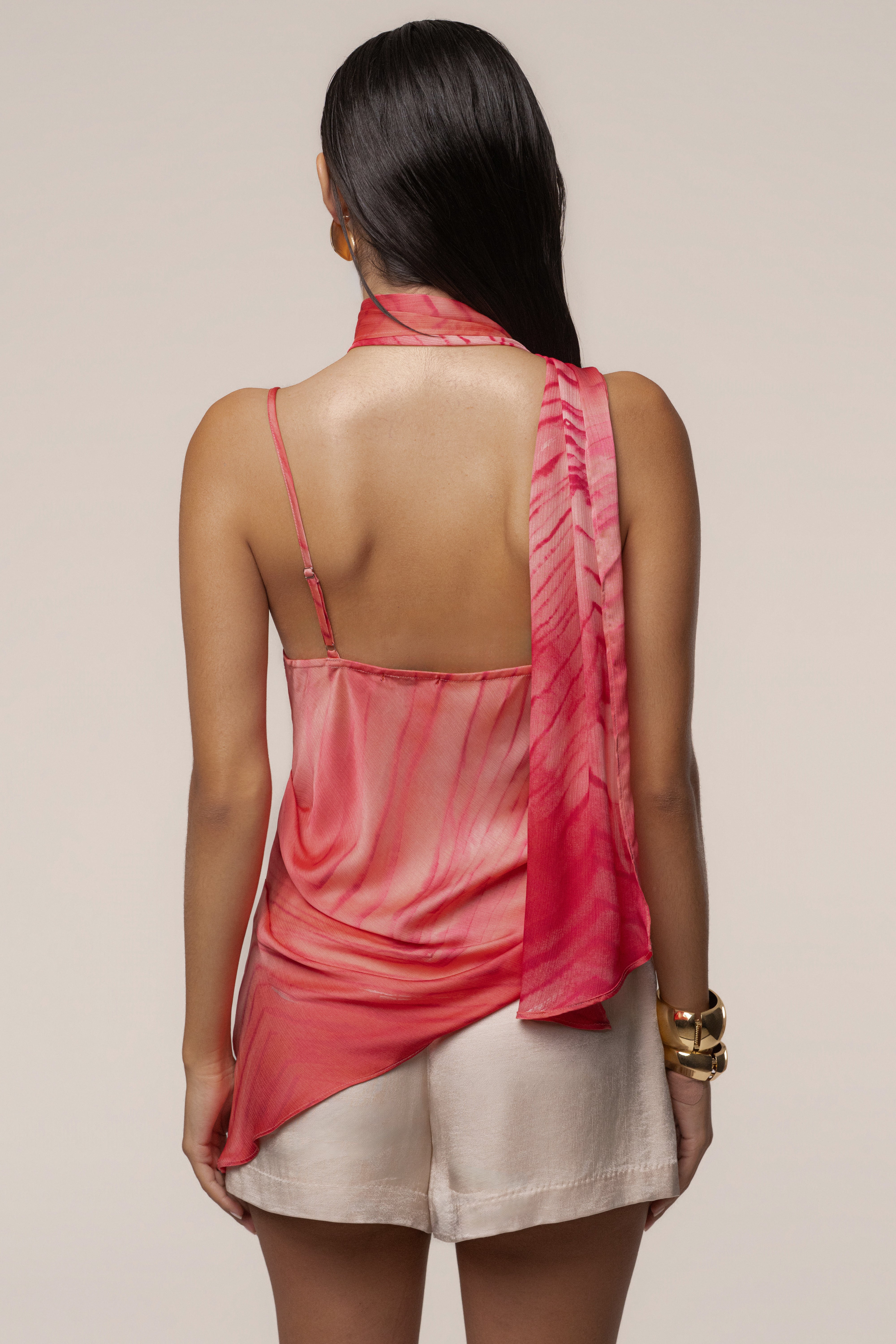Coral JLUXLABEL Selene asymmetrical top with unique draped design and off-shoulder style, perfect for stylish casual wear