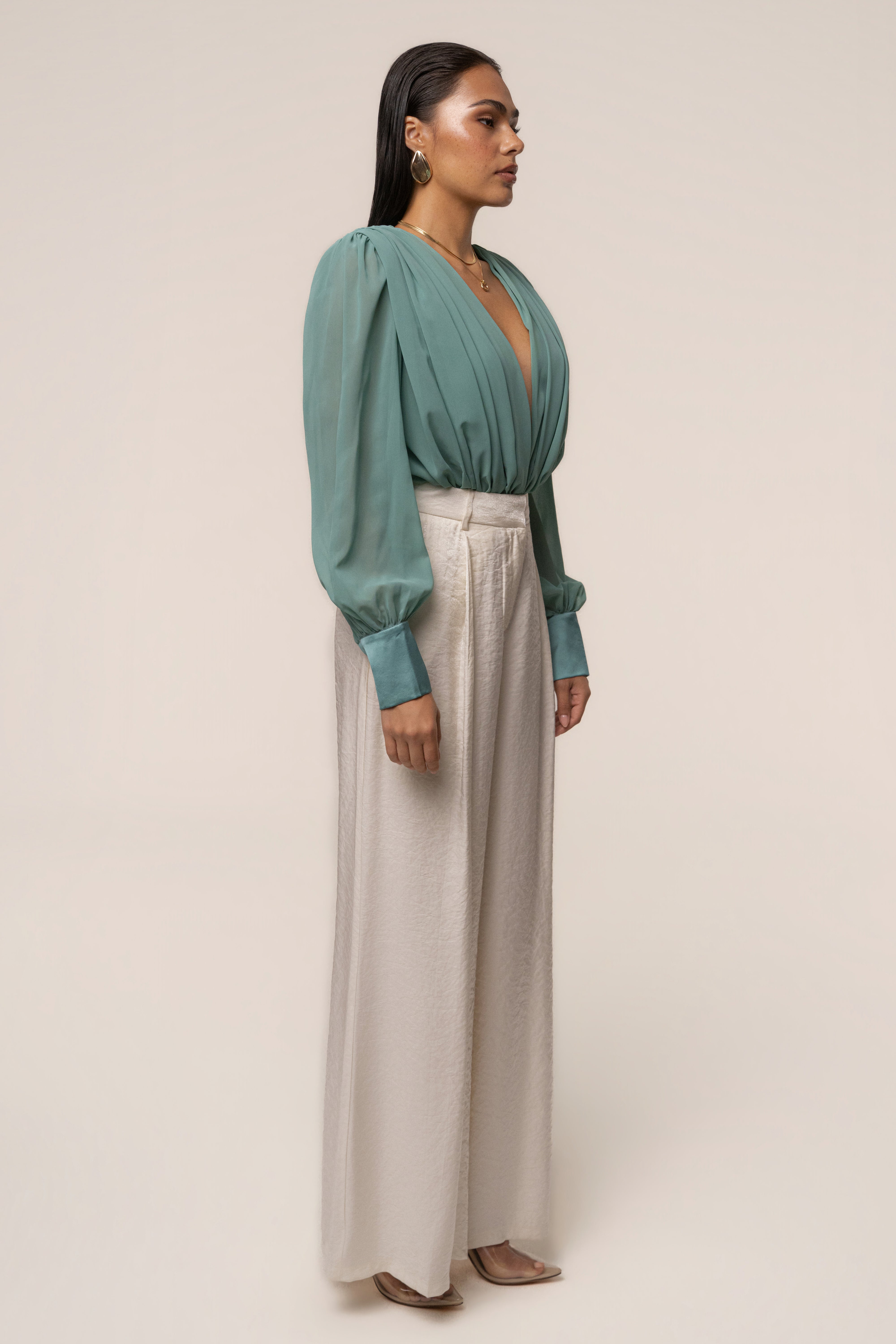 Teal JLUXLABEL pleated chiffon top with a flowy design and elegant pleats, perfect for casual or dressy occasions.
