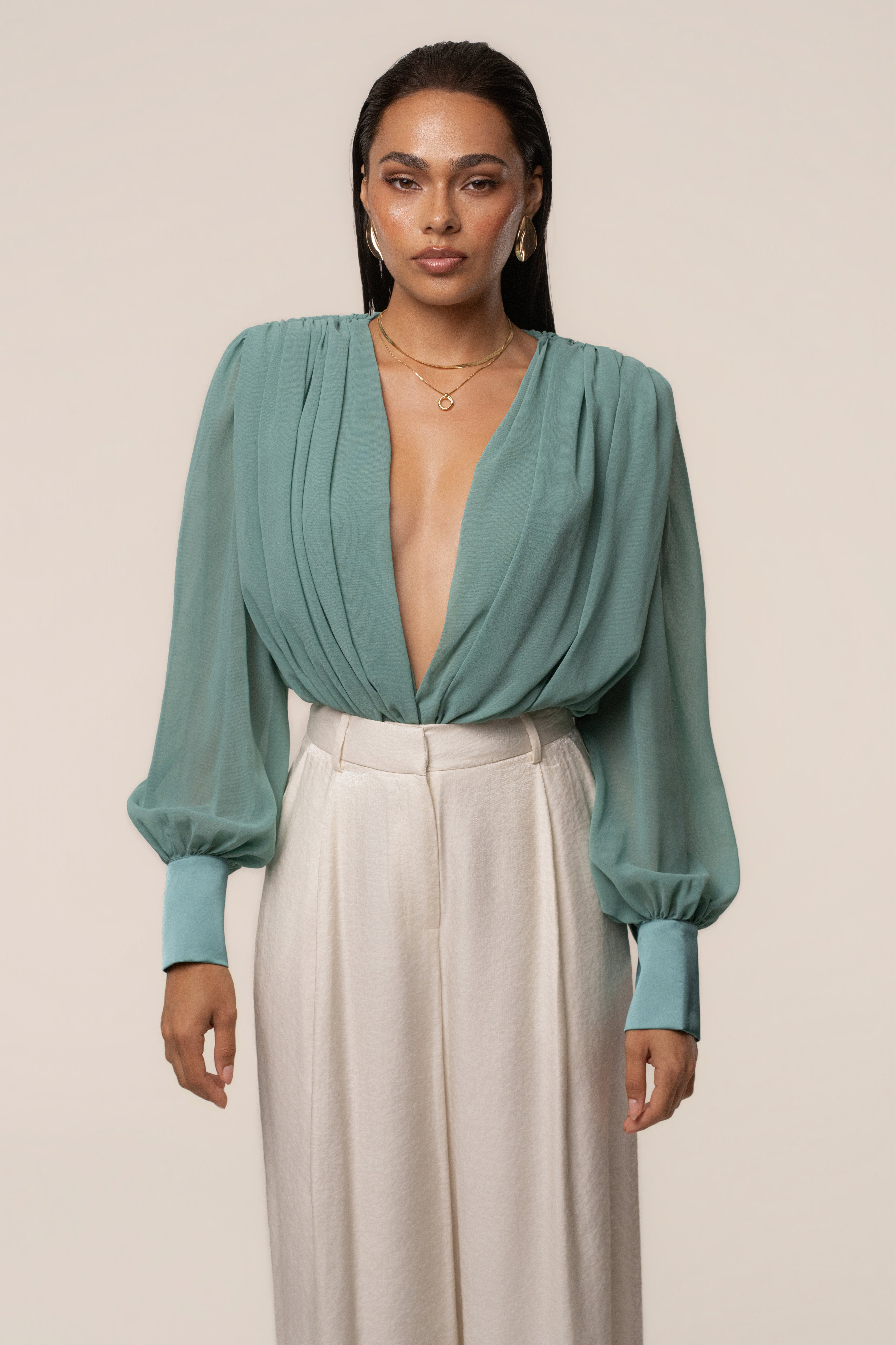 Teal JLUXLABEL pleated chiffon top with a relaxed fit and elegant design, showcasing lightweight fabric and stylish pleats.