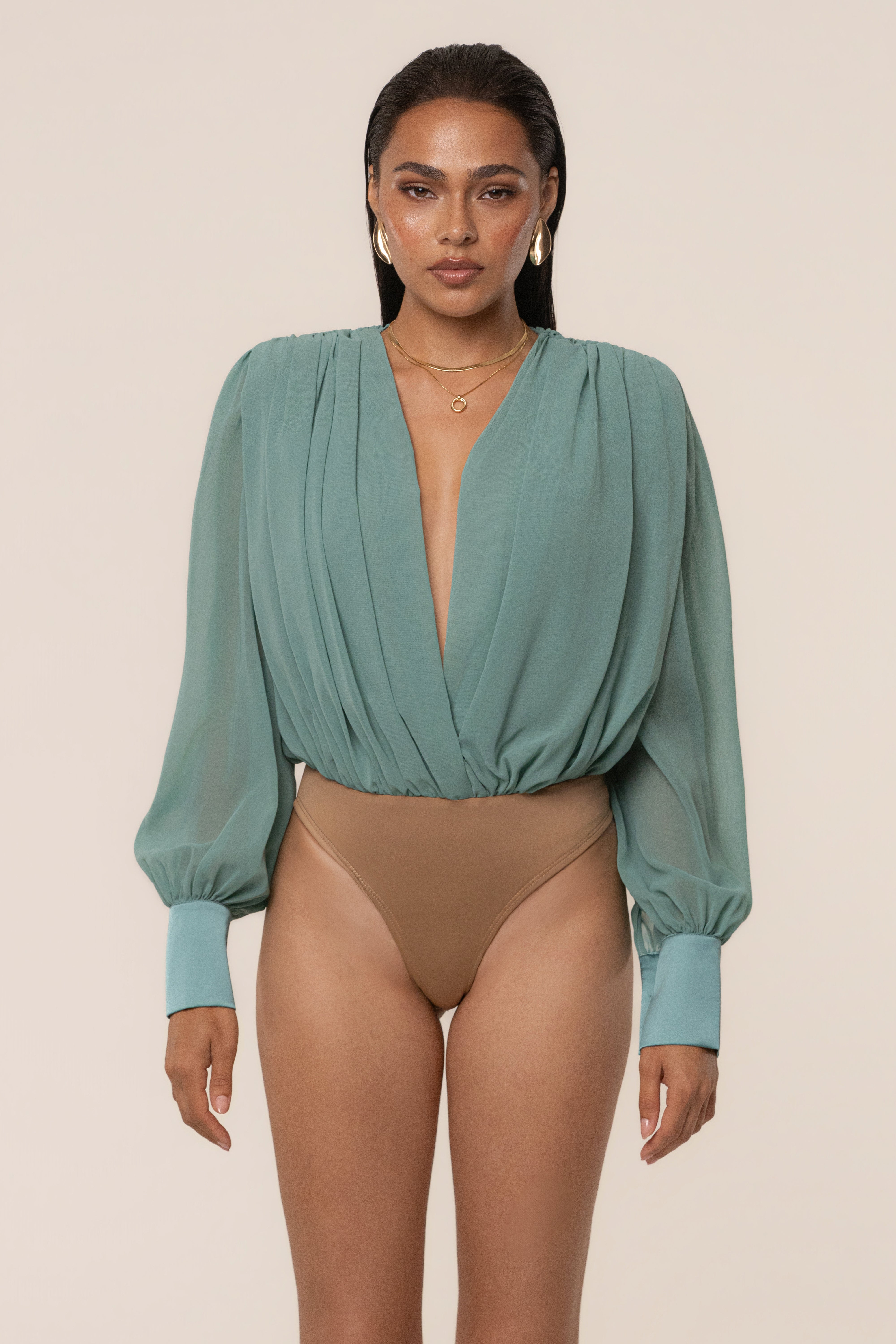 Teal JLUXLABEL pleated chiffon top with flowing fabric and elegant design, perfect for stylish casual or formal wear.