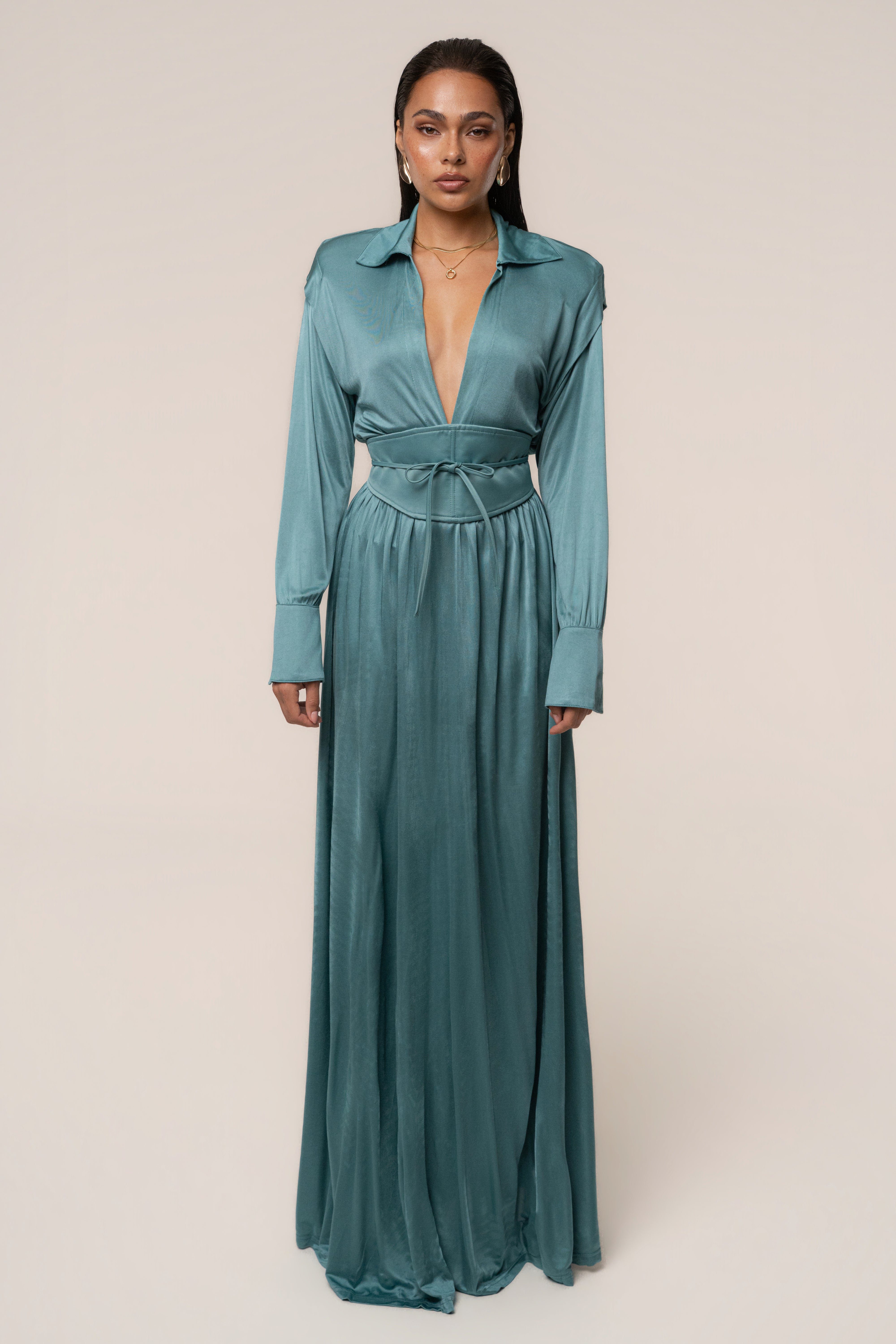 Teal high line collar maxi dress by JLUXLABEL featuring a sleek, elegant design and flowing fabric.