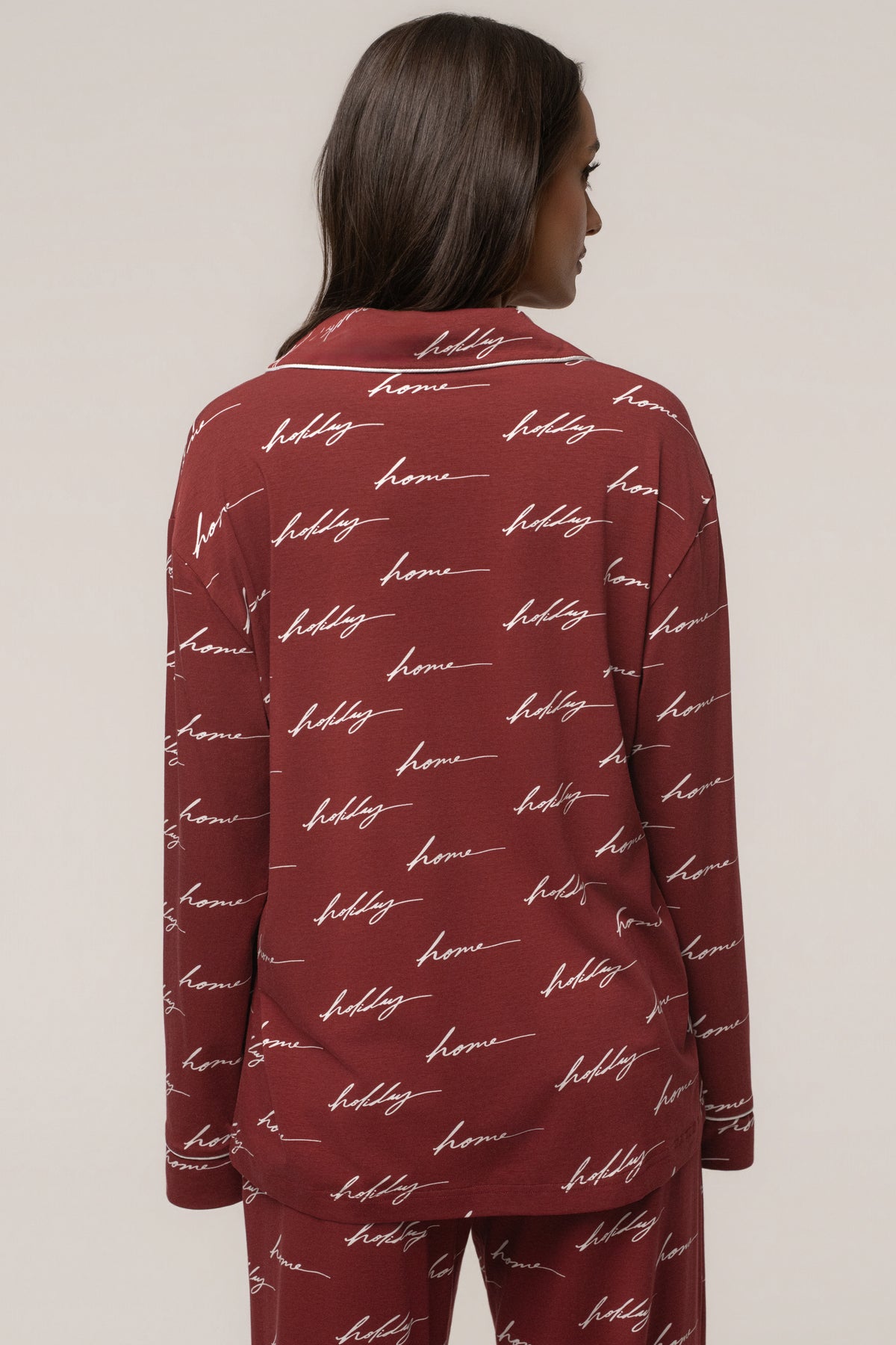 Burgundy JLUXLABEL adult pajama set with holiday-themed design, featuring long sleeve top and matching pants, cozy for home wear.