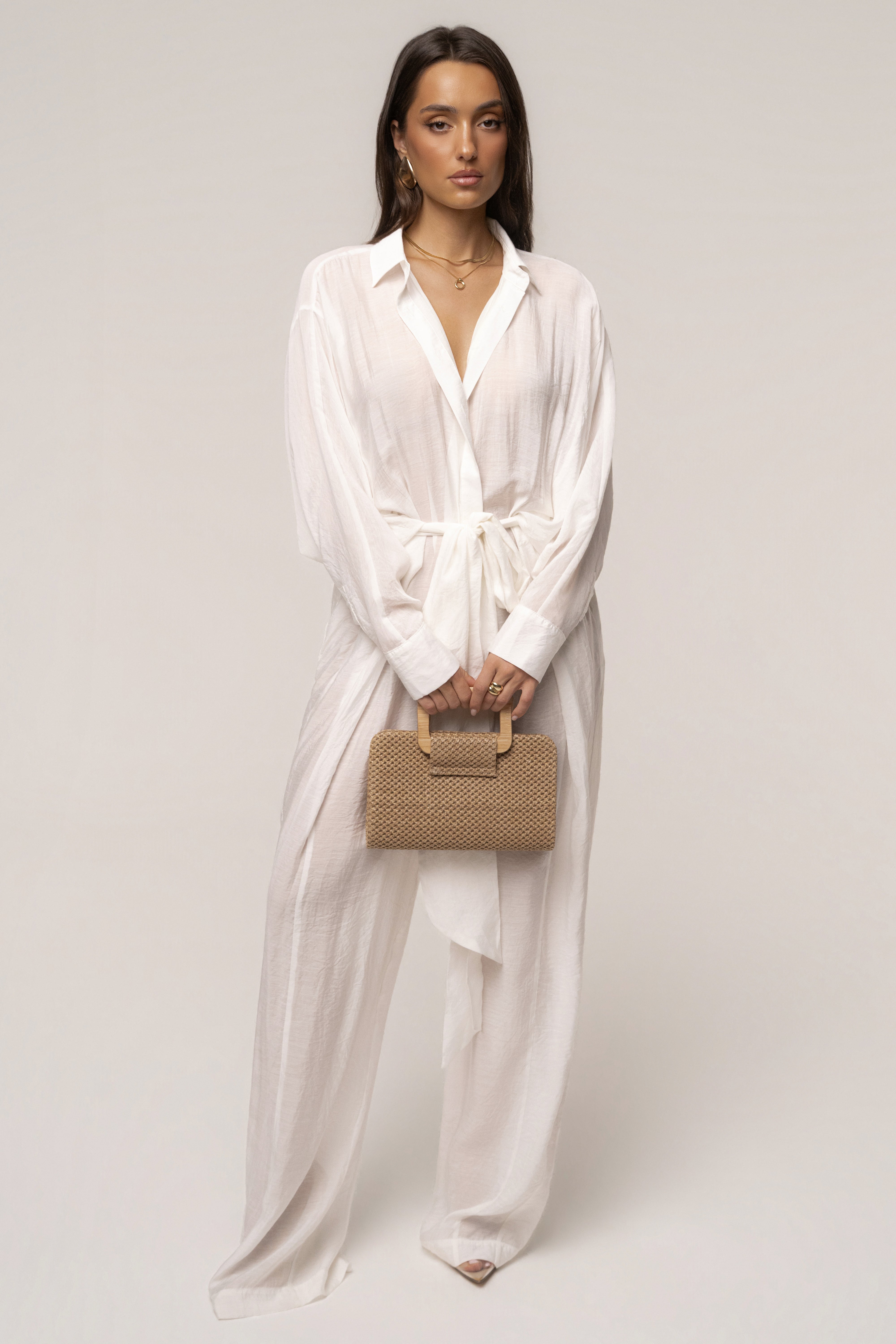 Brown driftwood clutch bag from JLUXLABEL with textured wood-like surface, compact design, perfect for accessories and evening outings.