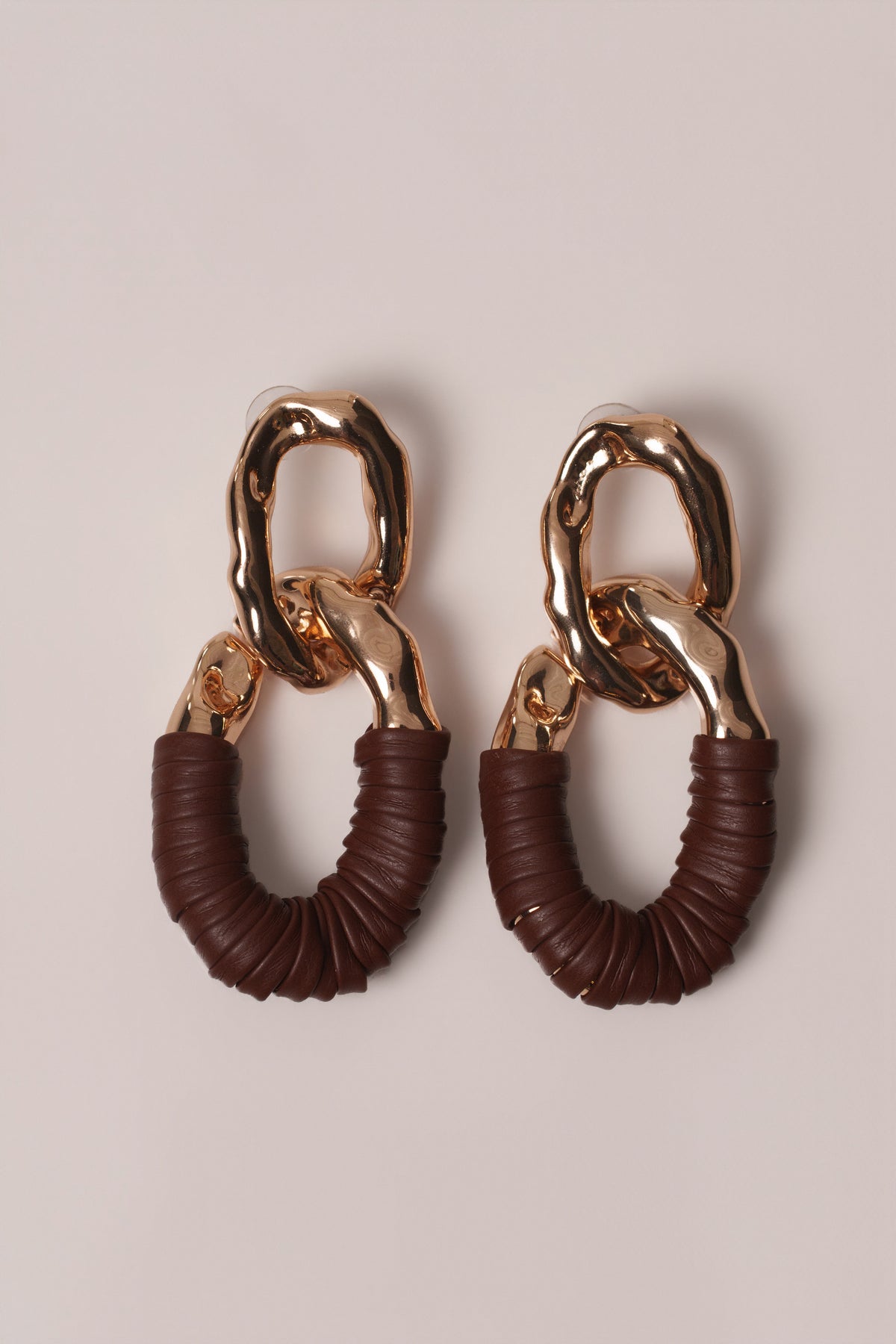 Brown Camille earrings by JLUXLABEL, stylish jewelry with gold-tone accents and elegant design, shown on a white background.