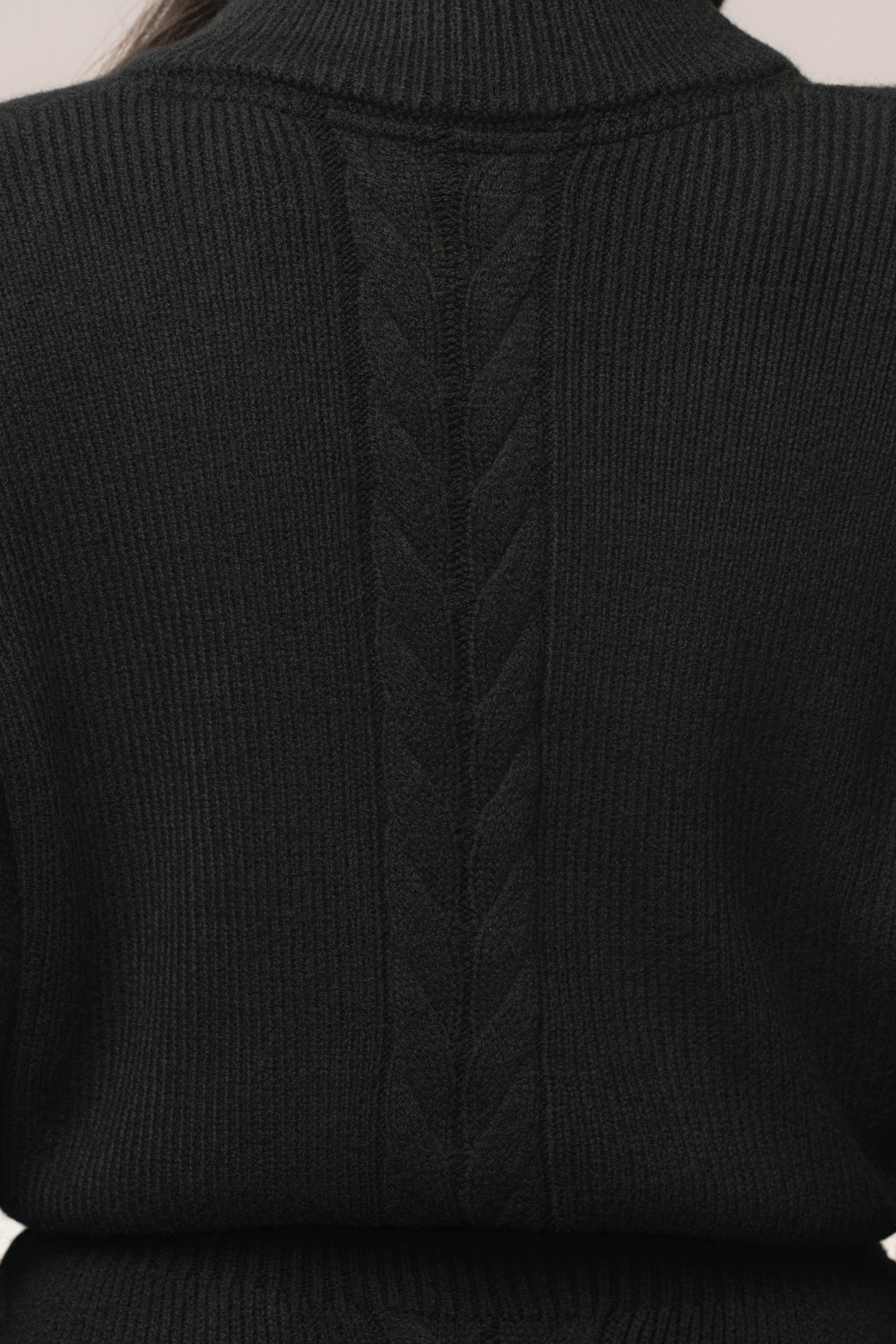 Black Cozy Intentions Ribbed Dress by JLUXLABEL, featuring a fitted ribbed knit design and long sleeves, styled for casual wear.