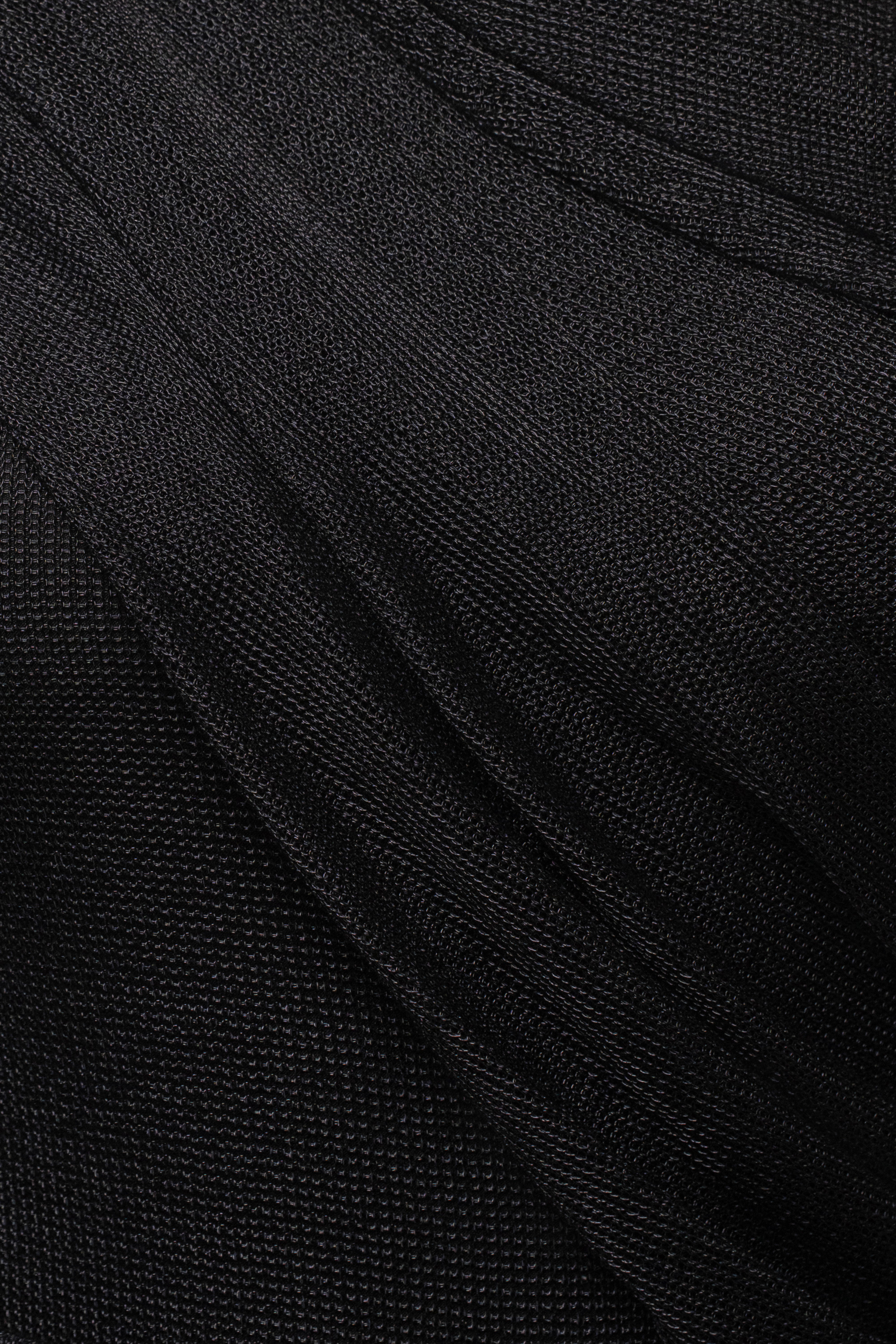 Black opulent metallic bodysuit from JLUXLABEL, featuring a sleek, shiny fabric and fitted design, perfect for stylish tops.