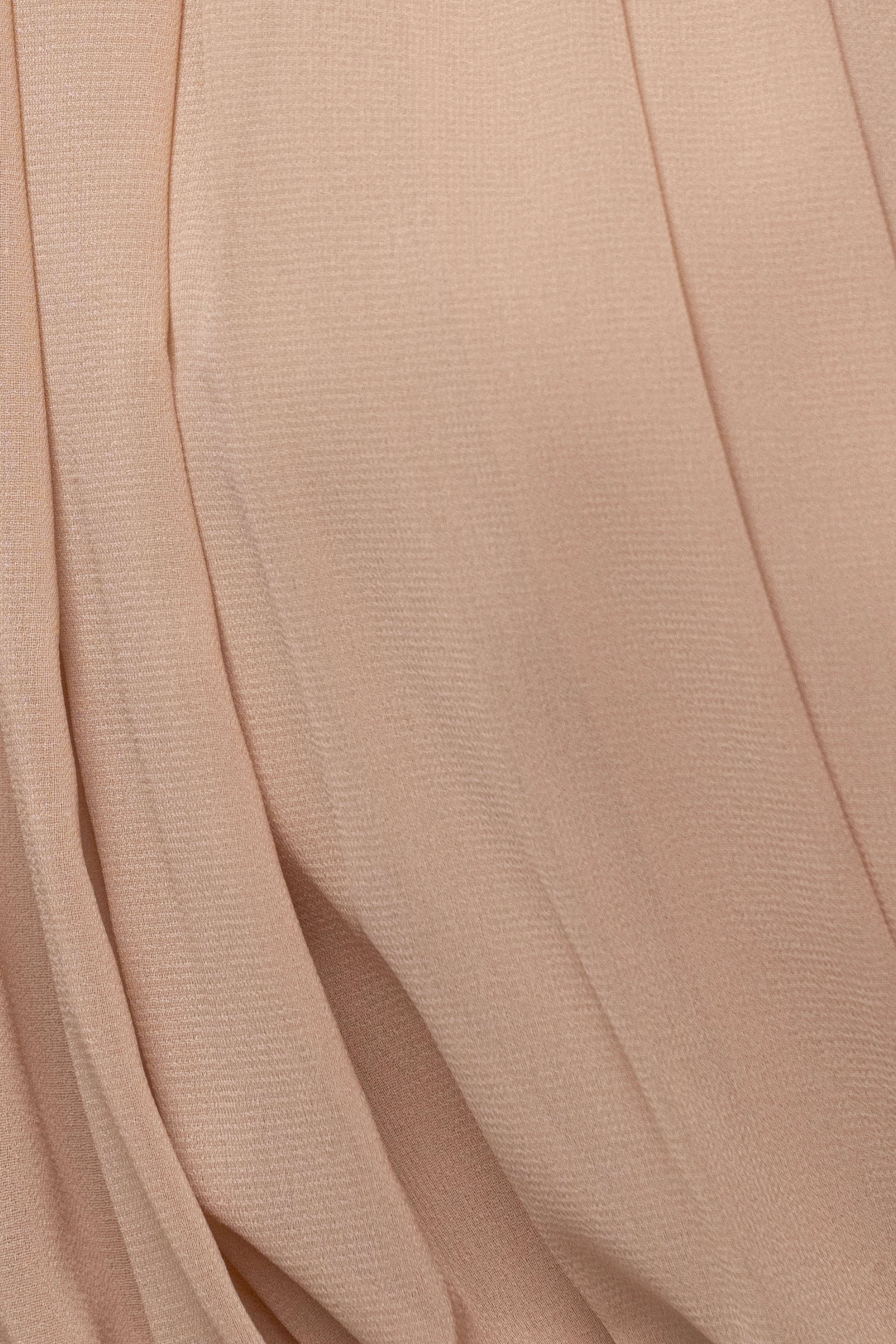 Tan JLUXLABEL pleated chiffon top with refined design, featuring a flowy, elegant silhouette and delicate pleats.