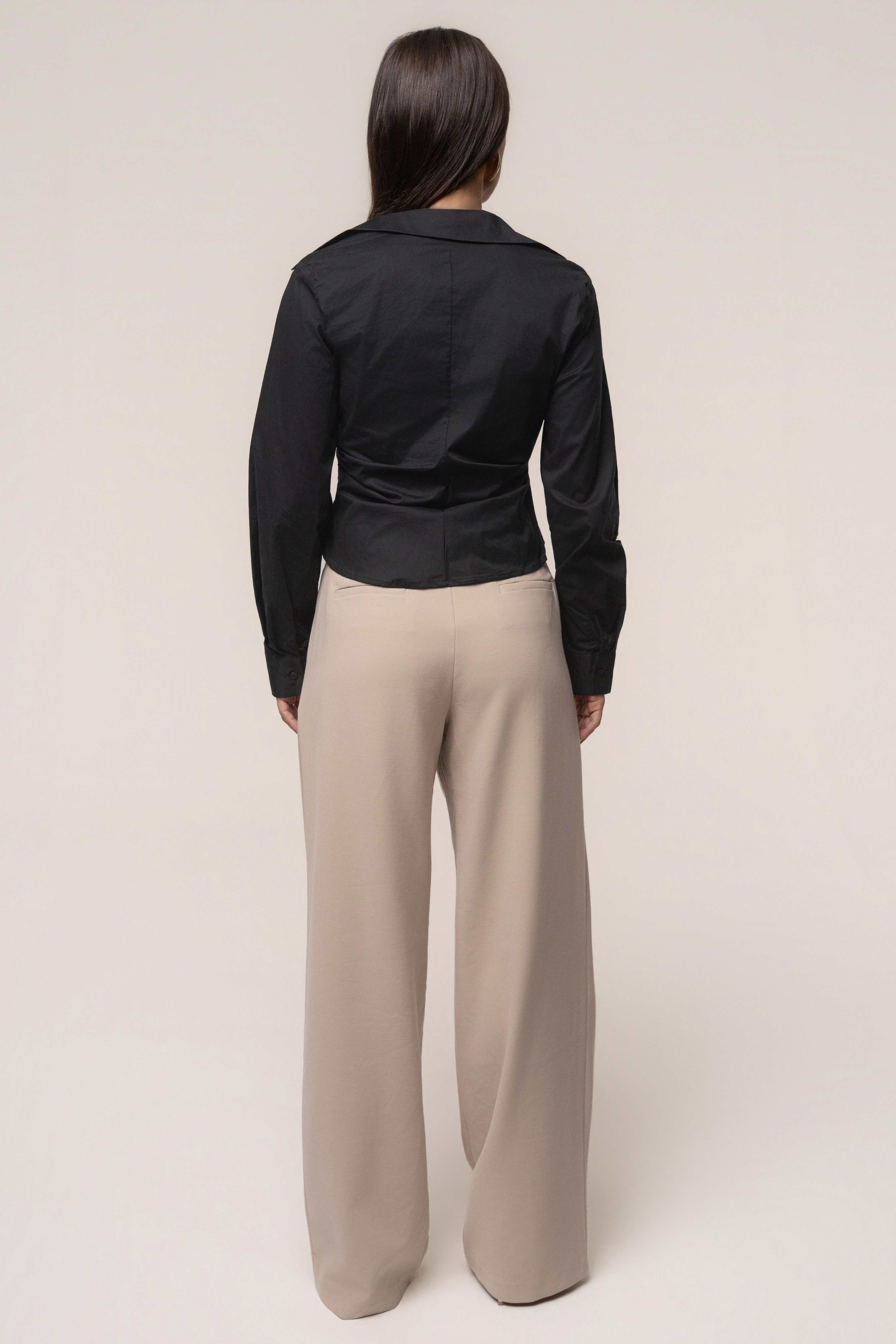 Black Sculpt and Form blouse by JLUXLABEL, featuring a fitted design and stylish top silhouette.