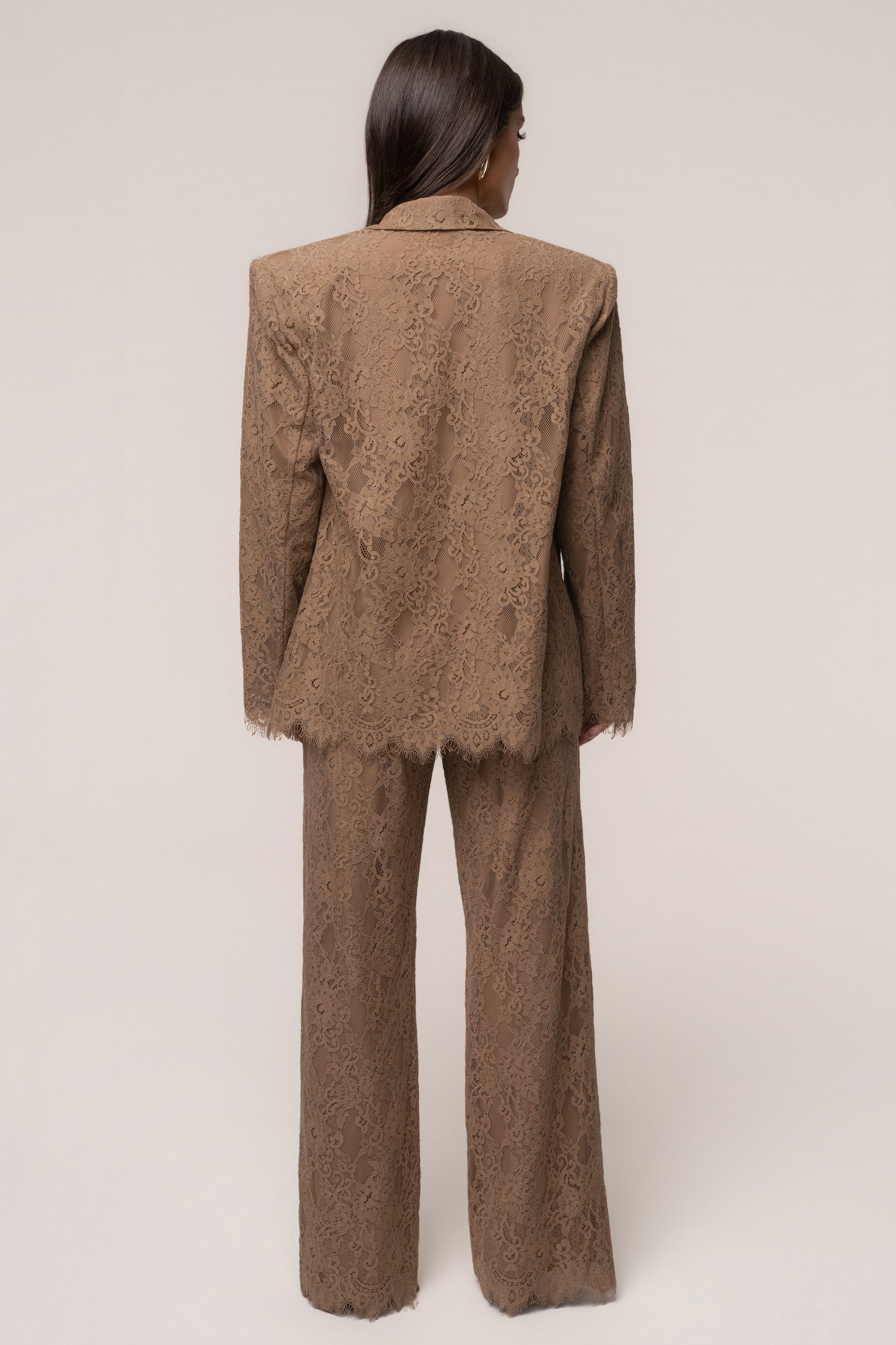 Tan lace and desire blazer by JLUXLABEL, stylish outerwear with lace detailing, shown on a hanger against a neutral background.