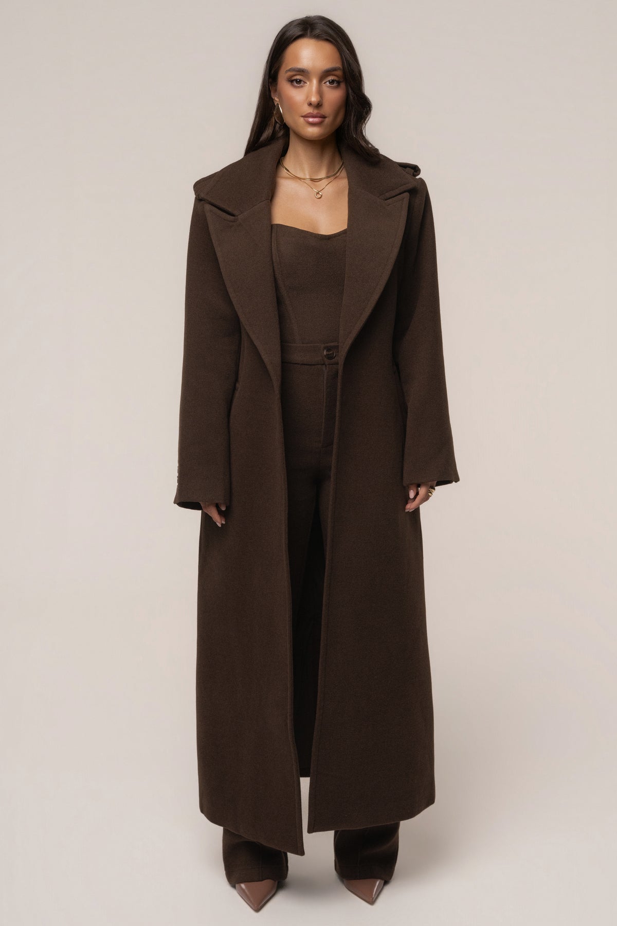 Chocolate Savannah beltless coat by JLUXLABEL, featuring a stylish outerwear design with a tailored fit and elegant belt details.