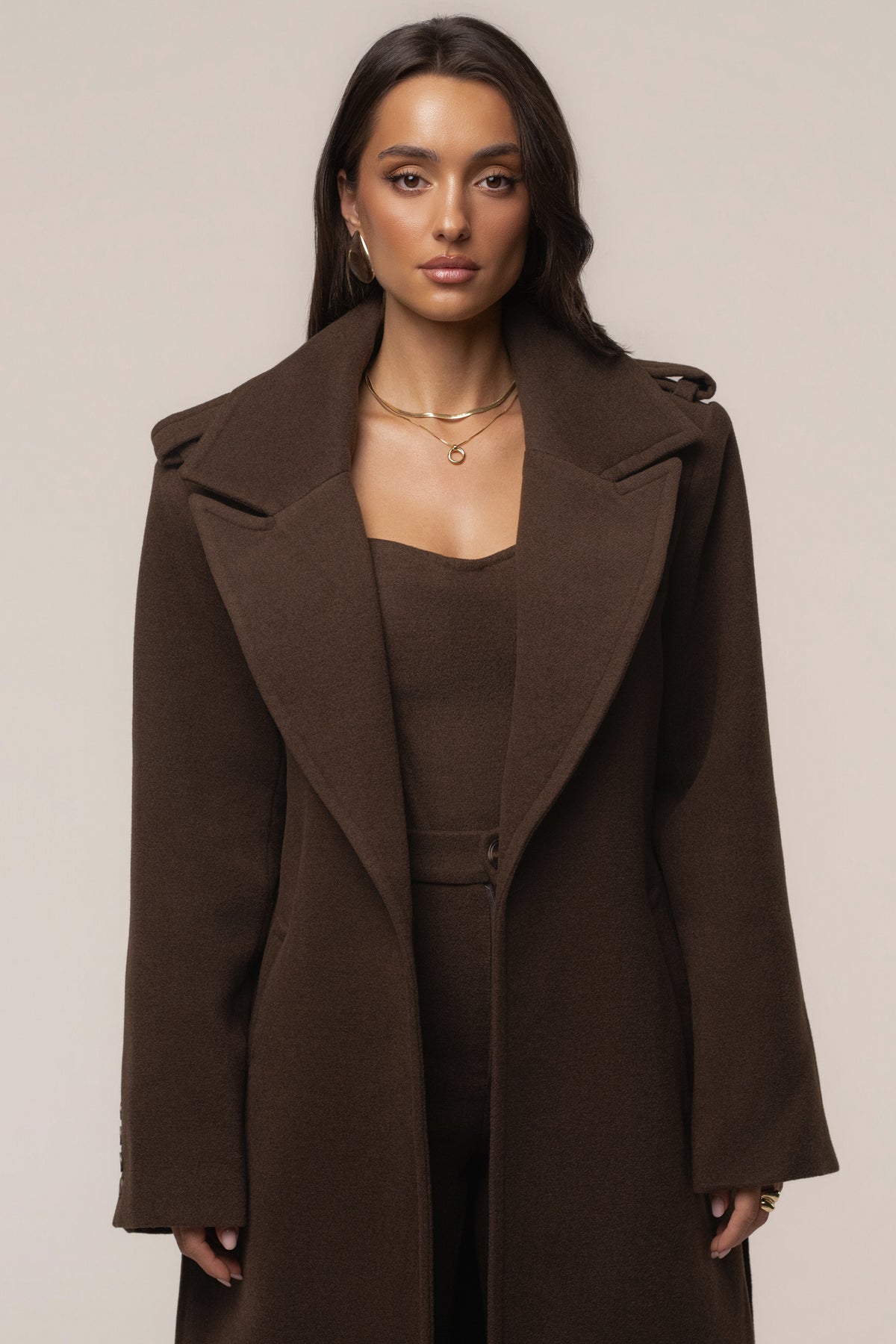 JLUXLABEL Chocolate Savannah belted coat, stylish outerwear with a tailored fit and button details, perfect for cold weather.