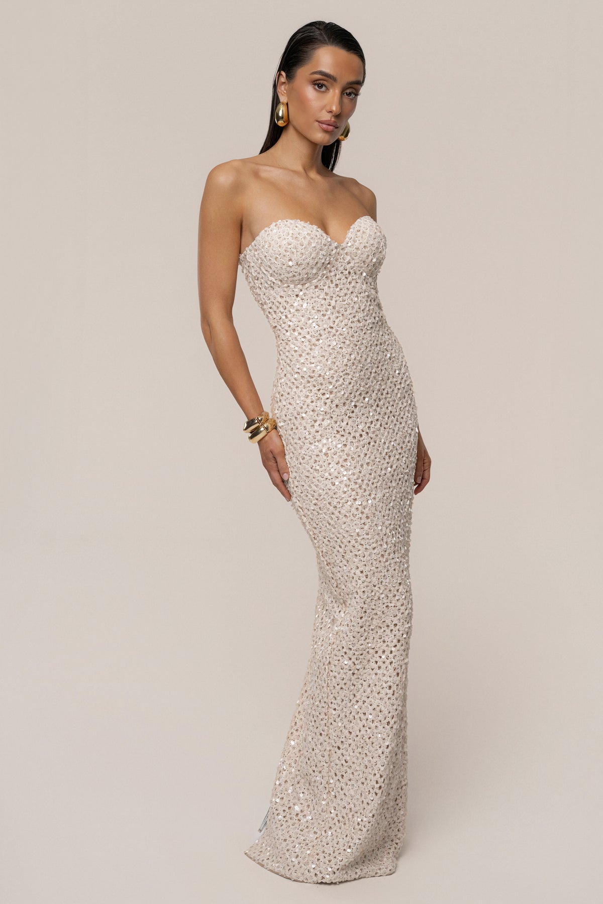 Beige Jewel Opulence sequin dress by JLUXLABEL, showcasing a glamorous, fitted dress with intricate sequin detailing and elegant design.