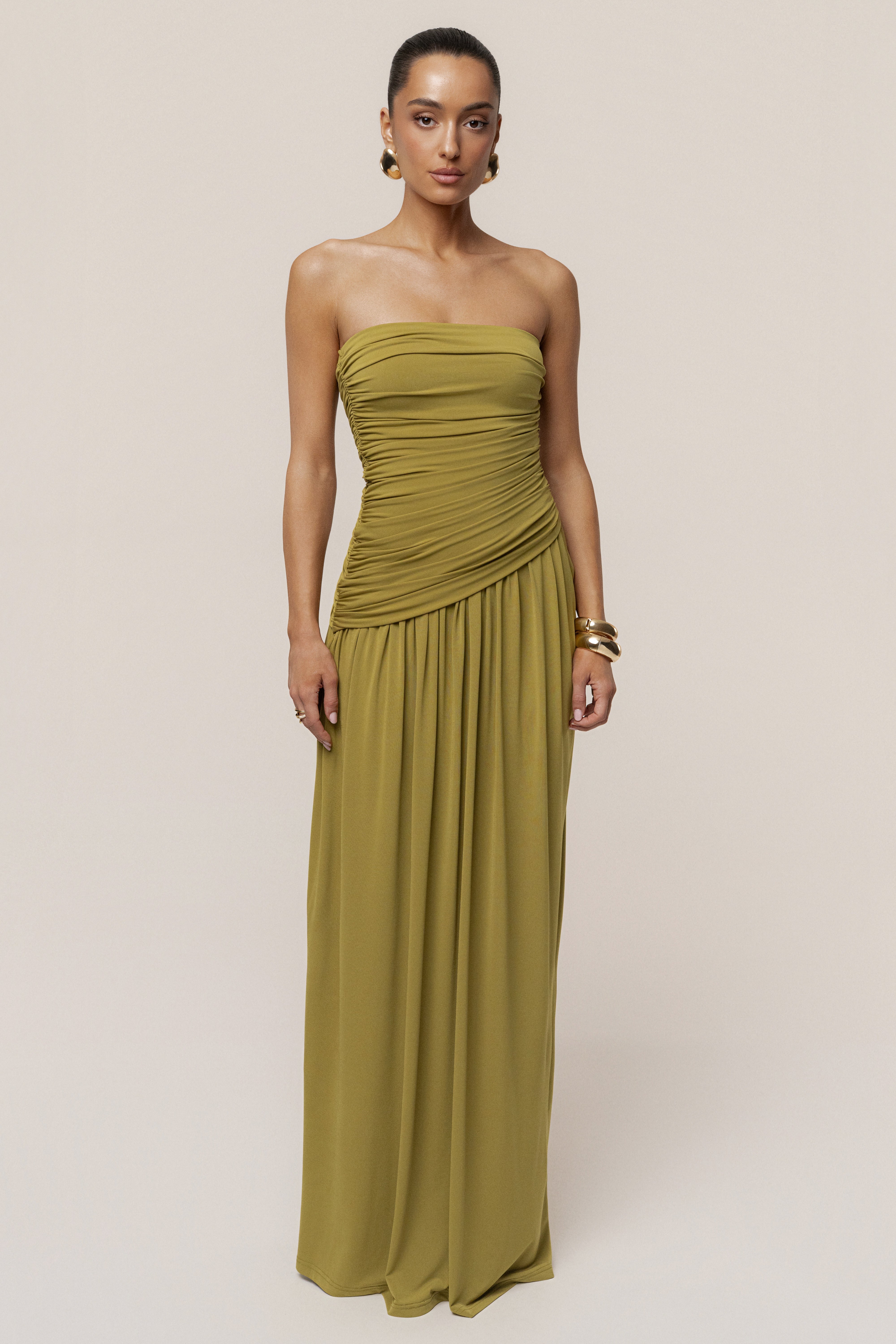 Moss green JLUXLABEL Vision Of Elegance maxi dress with flowing fabric and elegant design, perfect for formal occasions.