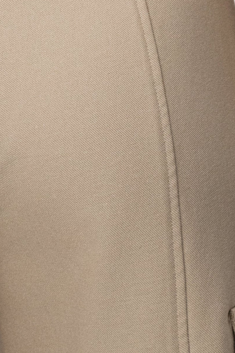 JLUXLABEL Stone Downtown Cargo Pant showing relaxed fit with multiple pockets and tapered legs, made from durable fabric.