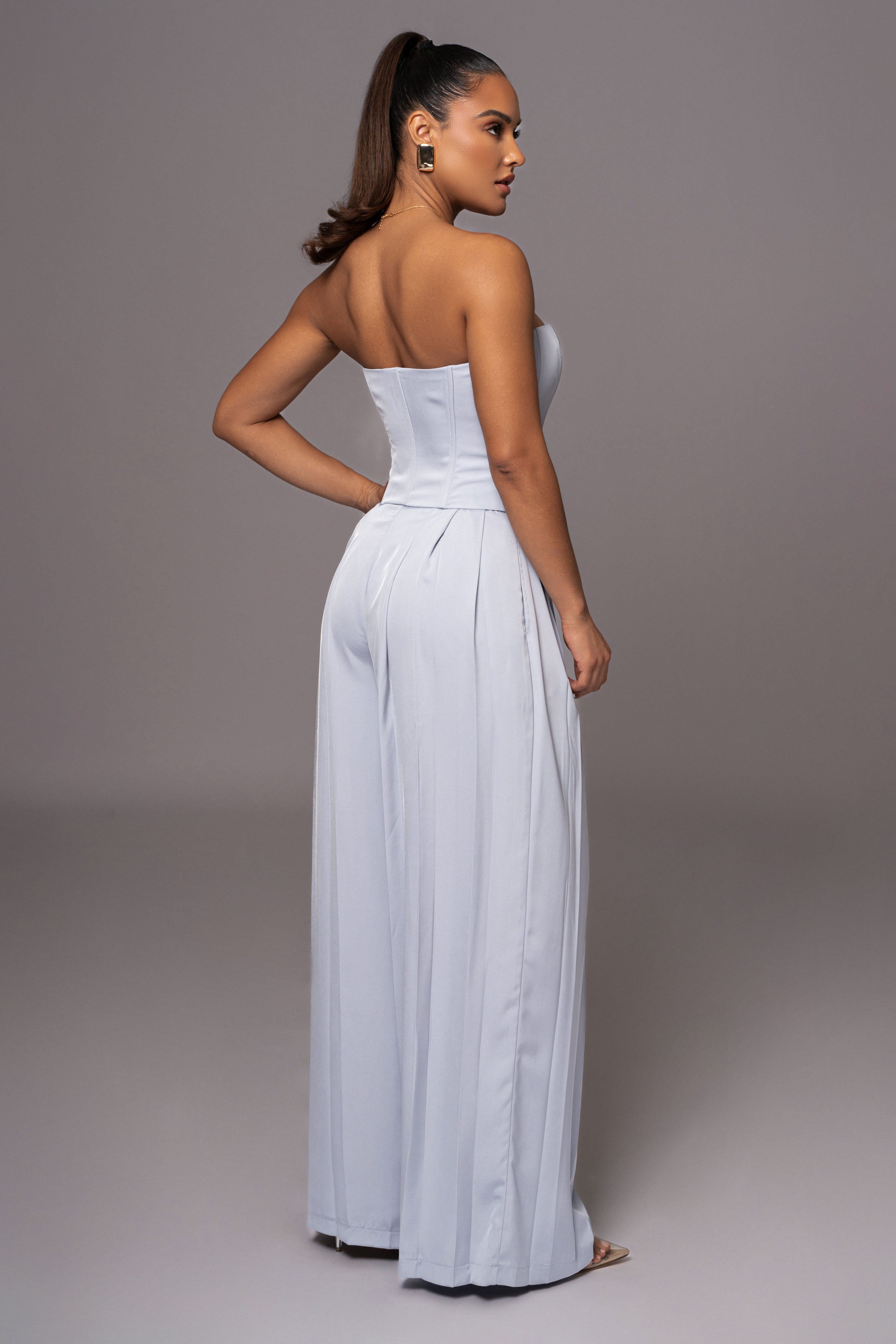 Blue Clara wide-leg pleated trousers by JLUXLABEL, shown on a model with a relaxed fit and stylish design.