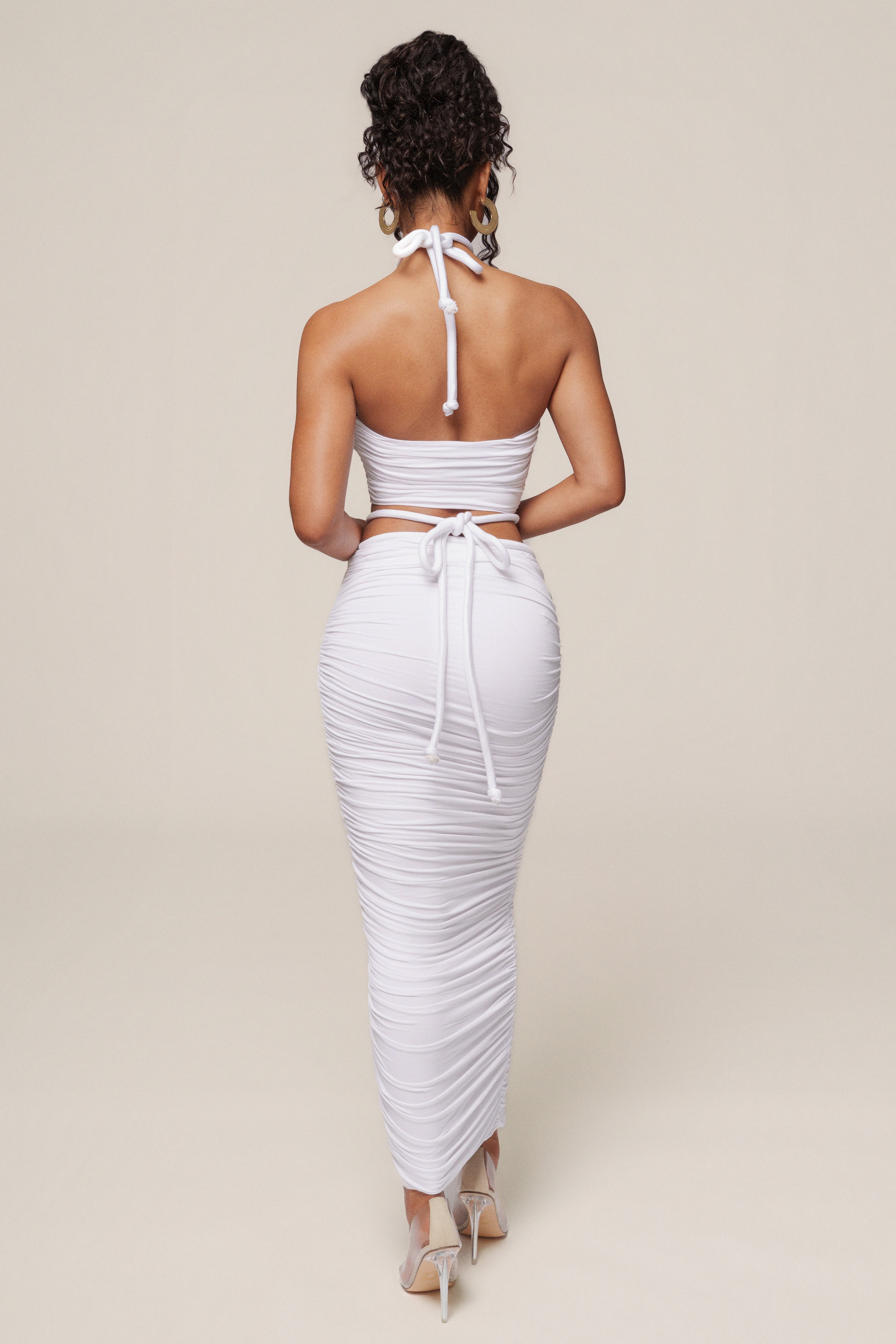 Ivory Go The Distance skirt set by JLUXLABEL featuring a stylish matching top and skirt ensemble.