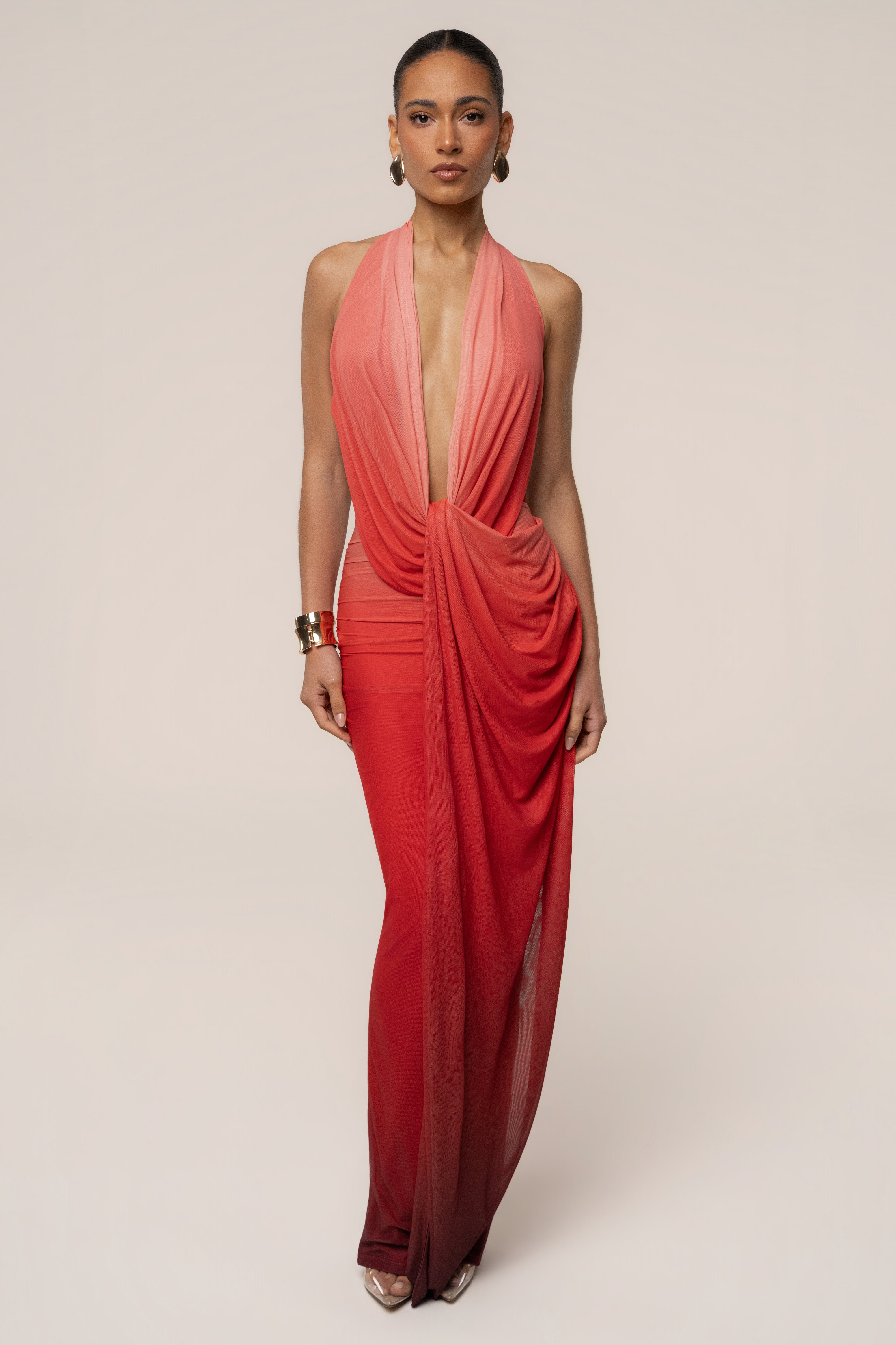 JLUXLABEL Terra Sol Alaina plunge maxi dress in flowing fabric, featuring a deep V neckline and elegant silhouette.