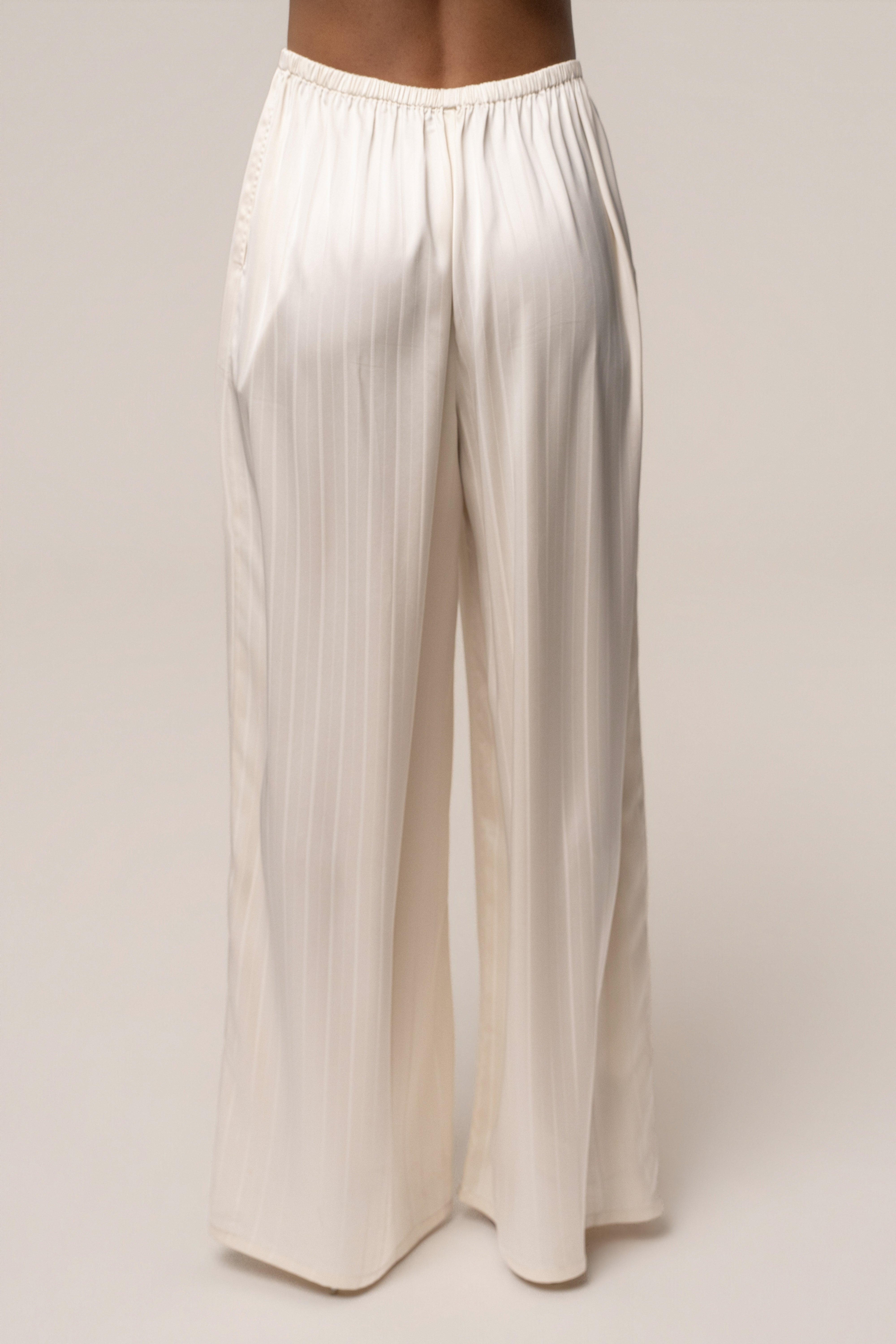 Ivory JLUXLABEL Standard Pant, stylish bottoms with a tailored fit, featuring smooth fabric and clean design.