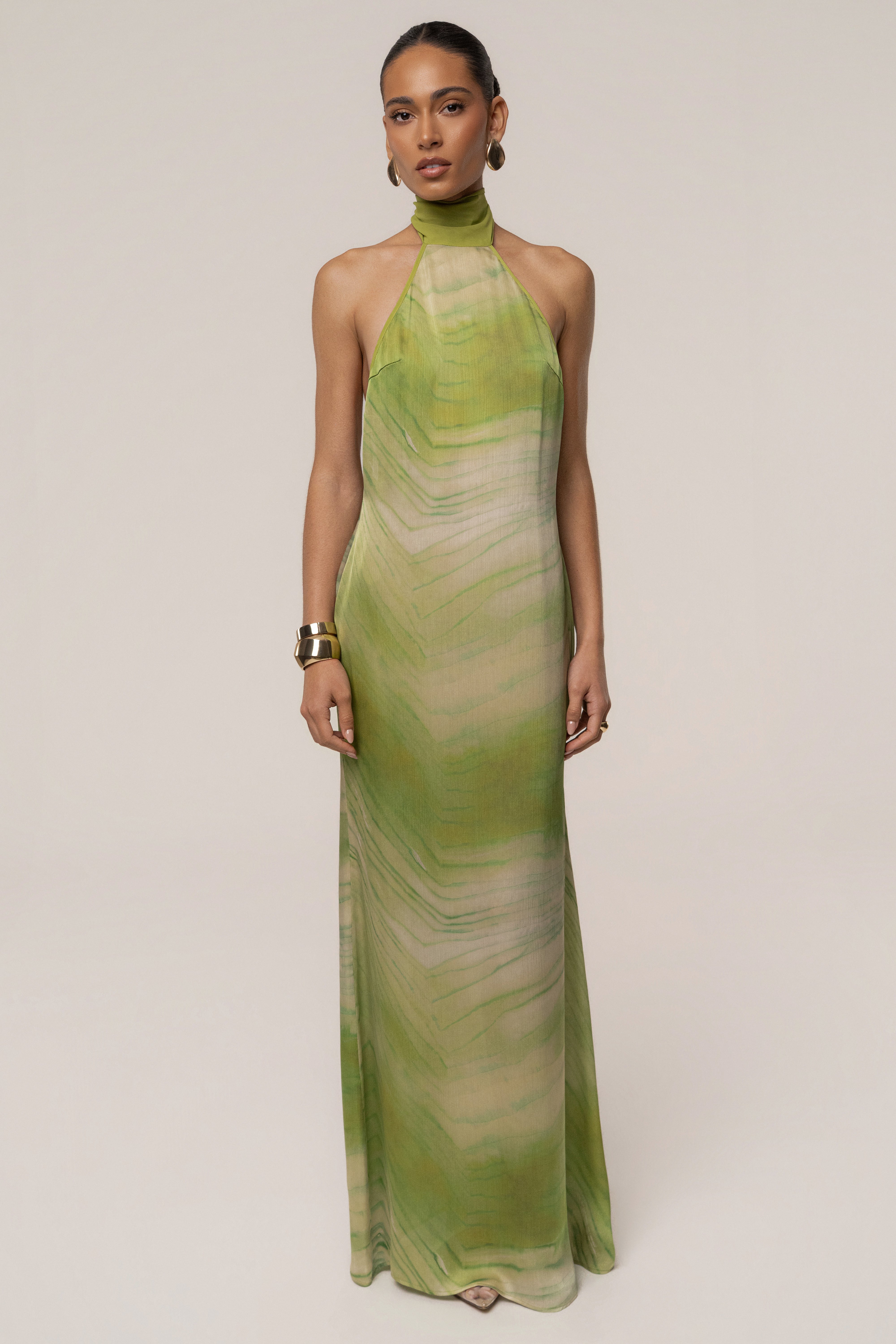 Green Sunset Waves maxi dress by JLUXLABEL featuring a flowing silhouette and vibrant wave-inspired pattern.