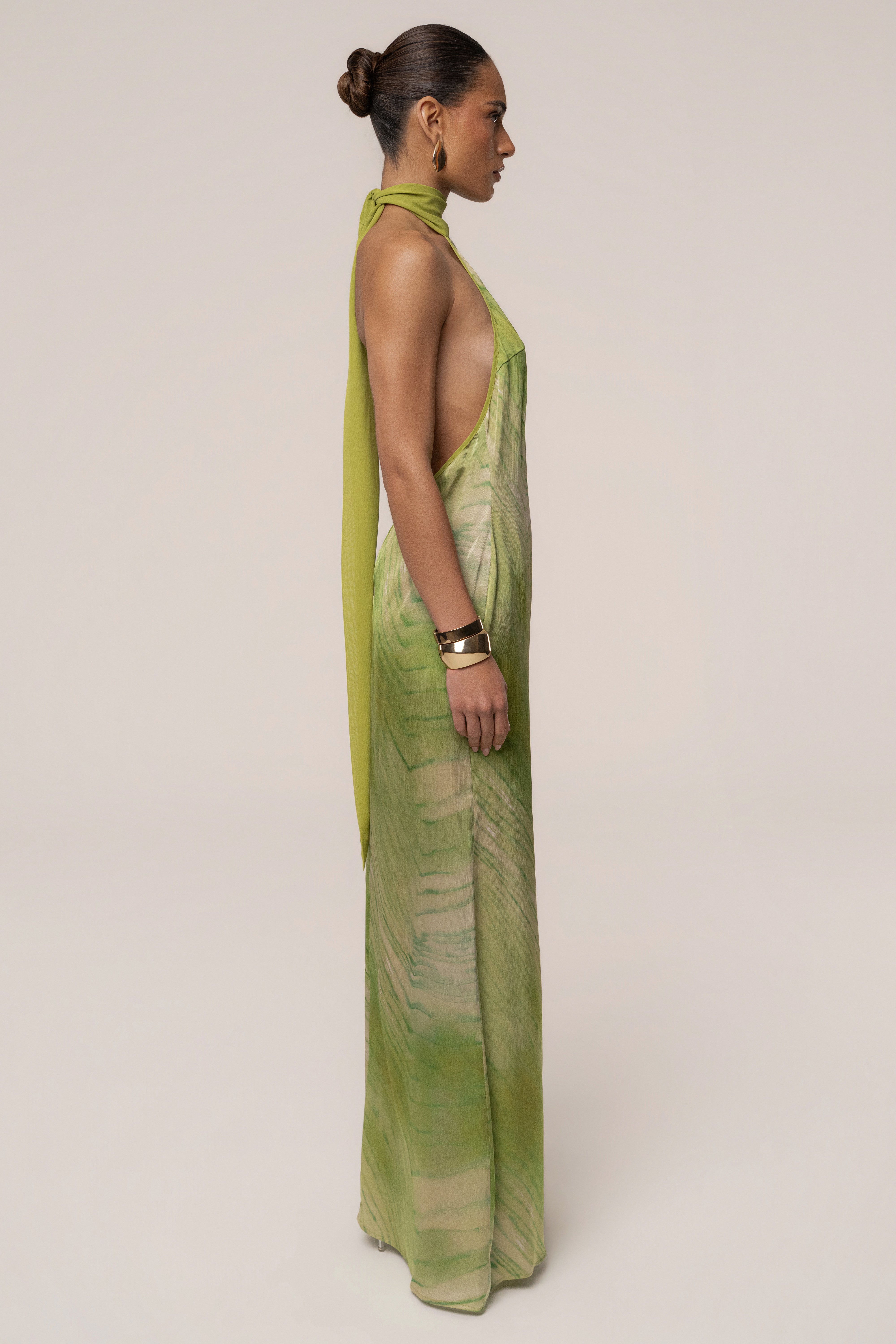 Green Sunset Waves maxi dress by JLUXLABEL featuring a flowing silhouette and vibrant wave pattern, perfect for summer occasions.