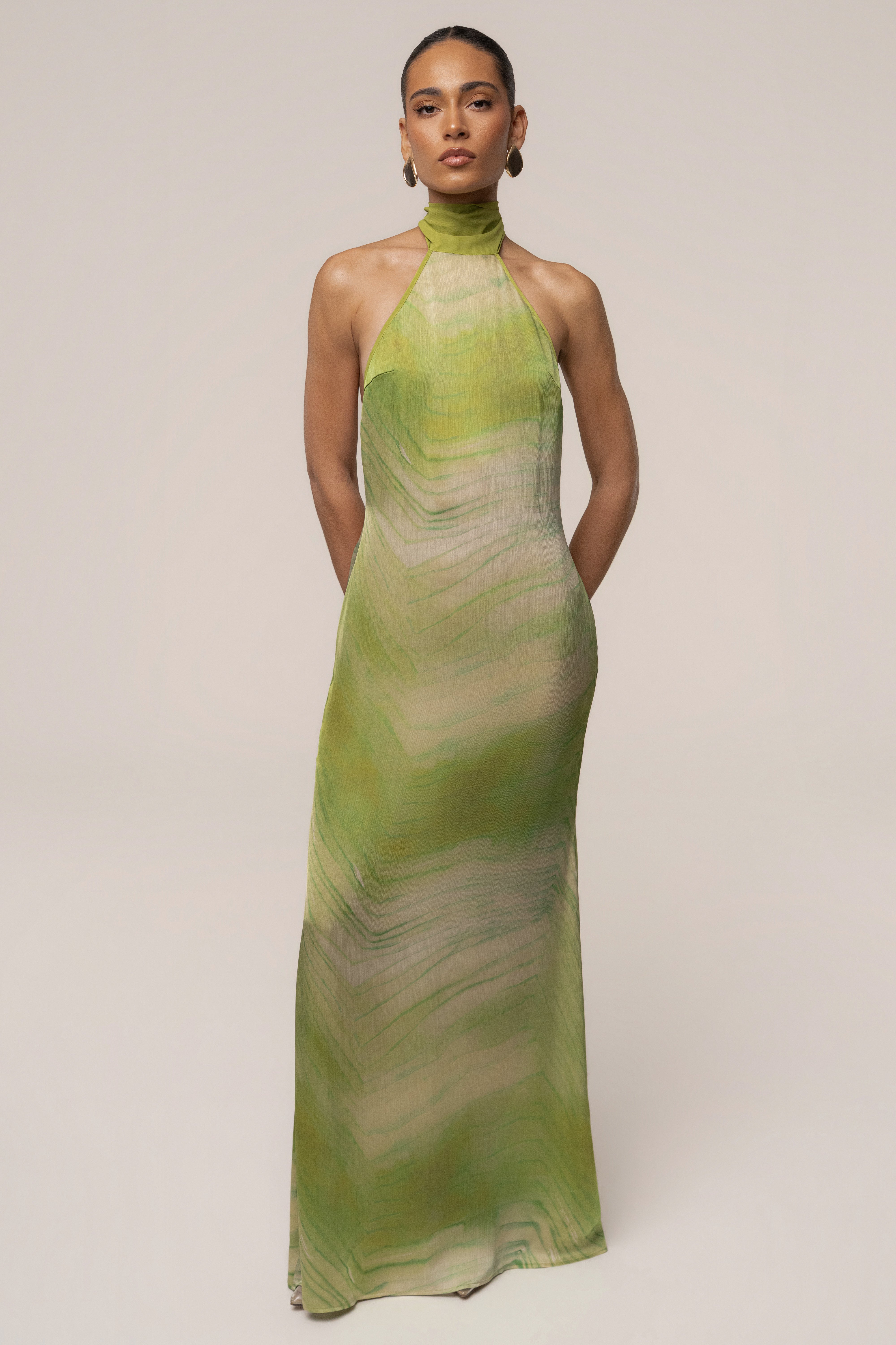 Green Sunset Waves maxi dress by JLUXLABEL featuring a flowing fabric and wave-inspired pattern, perfect for summer events.