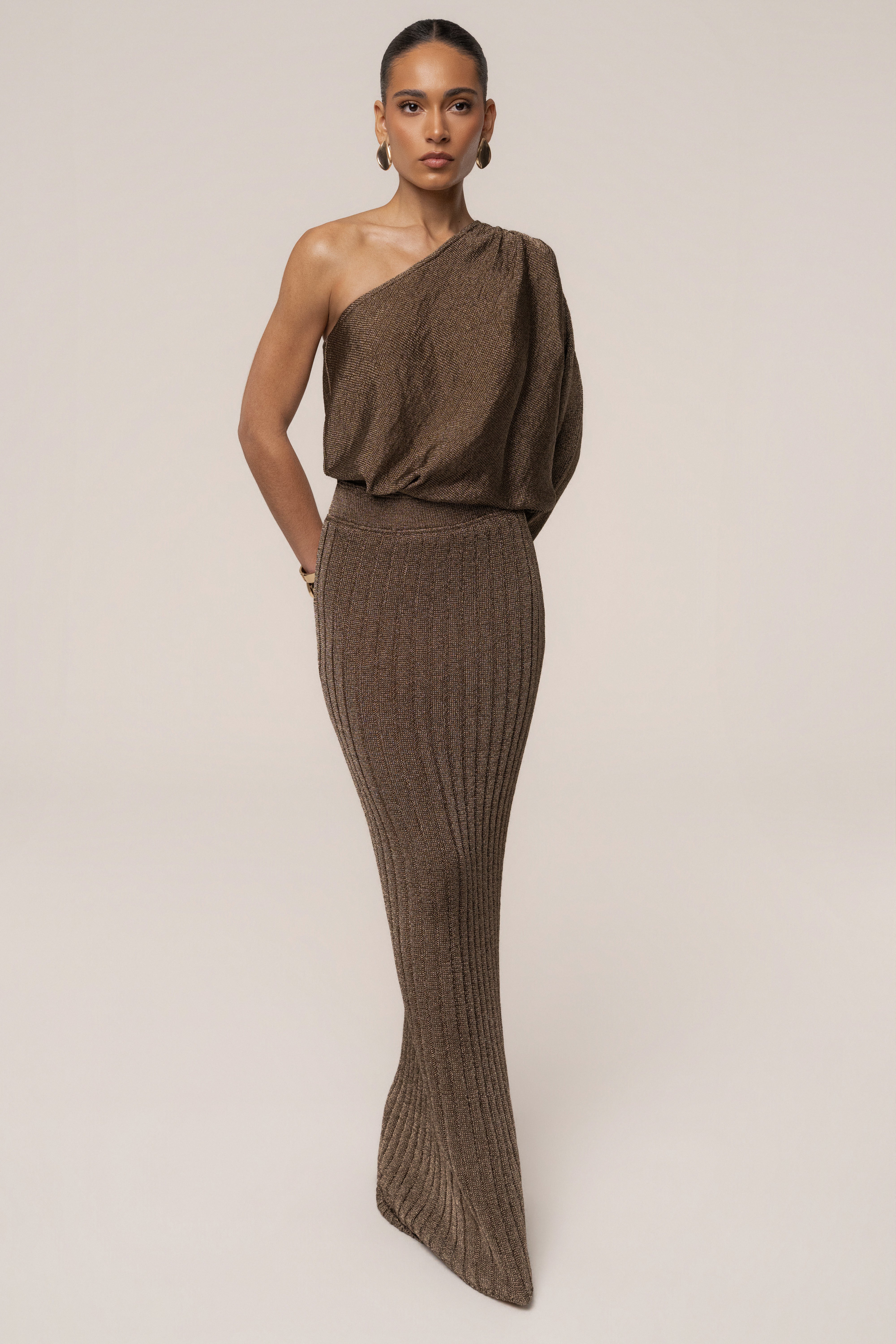 Bronze metallic maxi skirt by JLUXLABEL featuring a flowing resort-inspired design and elegant bottom style.