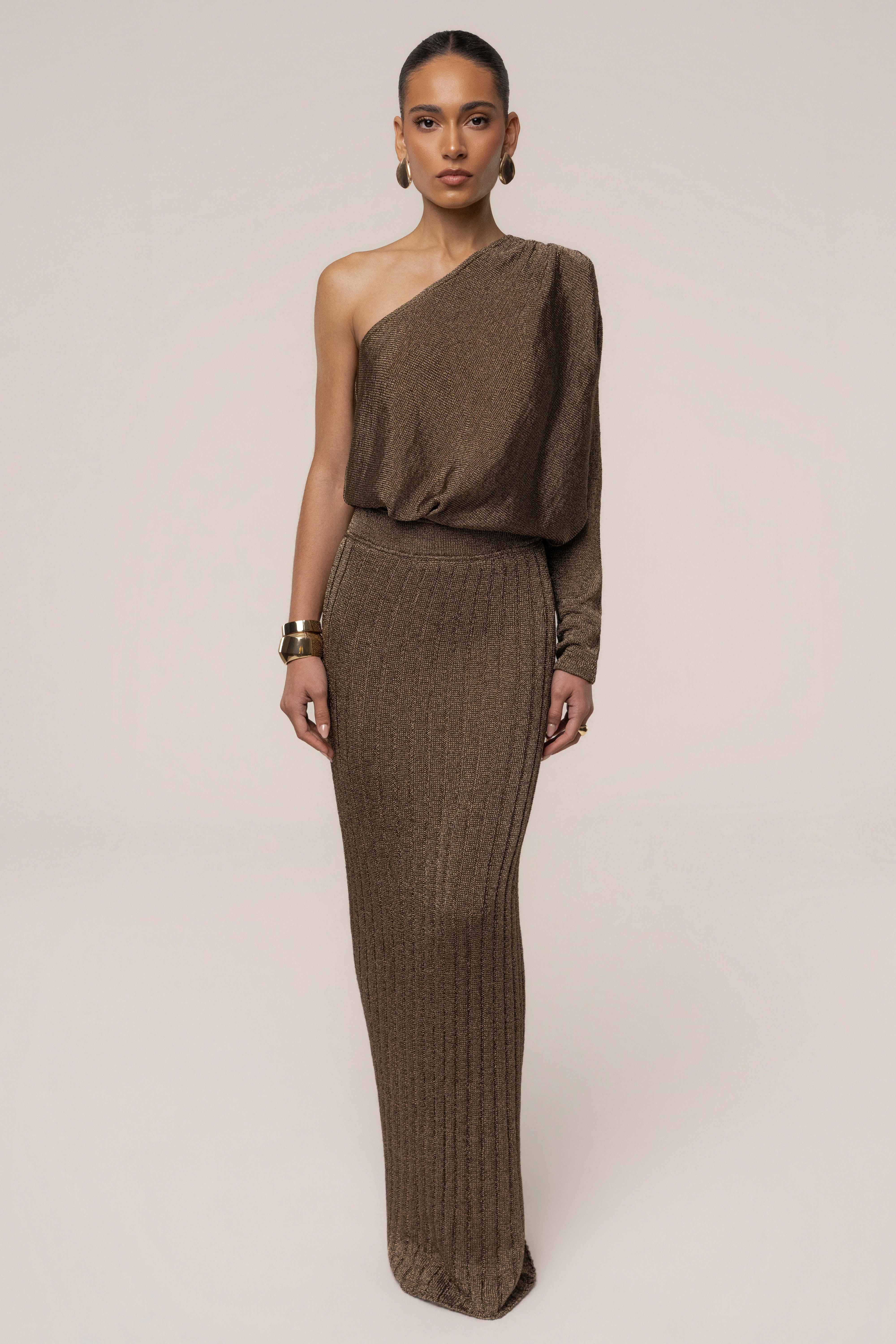 Bronze metallic maxi skirt from JLUXLABEL featuring a flowing resort-inspired design and elegant bottom style.