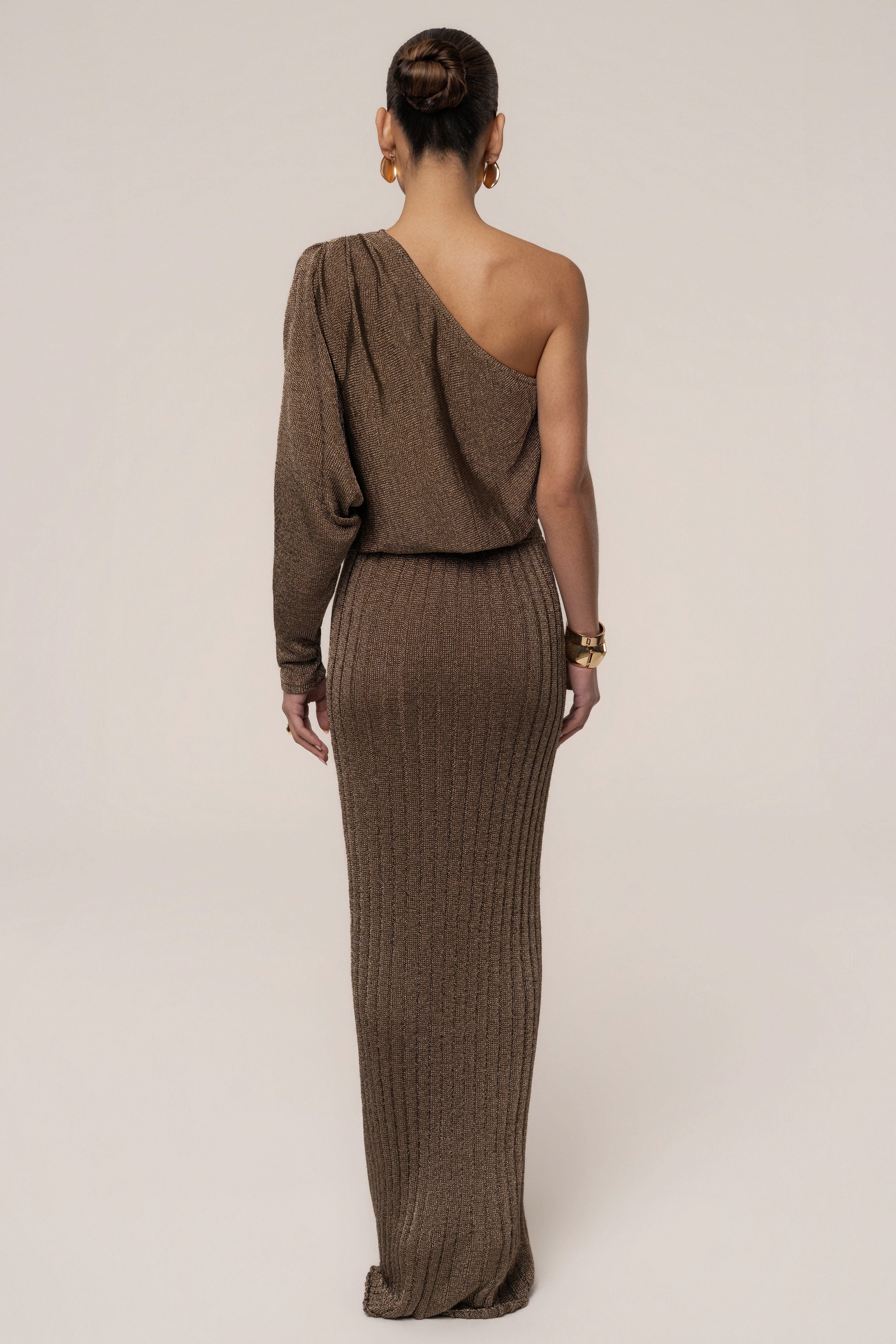 Bronze metallic maxi skirt from JLUXLABEL featuring a flowing resort-style design, stylish bottoms with a shiny, reflective finish.