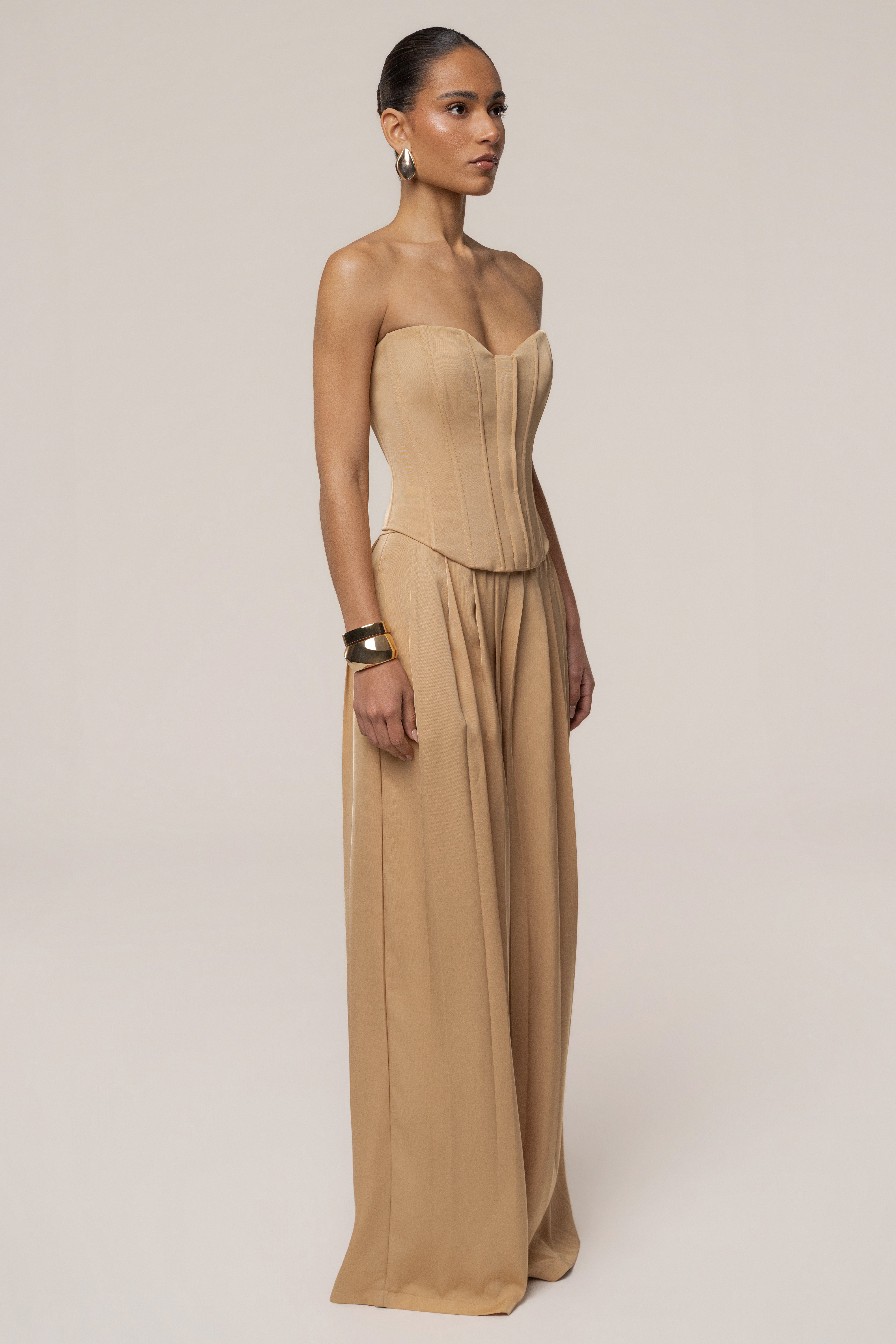Beige satin bustier top by JLUXLABEL featuring a fitted design and adjustable straps, perfect for stylish casual or dressy looks.