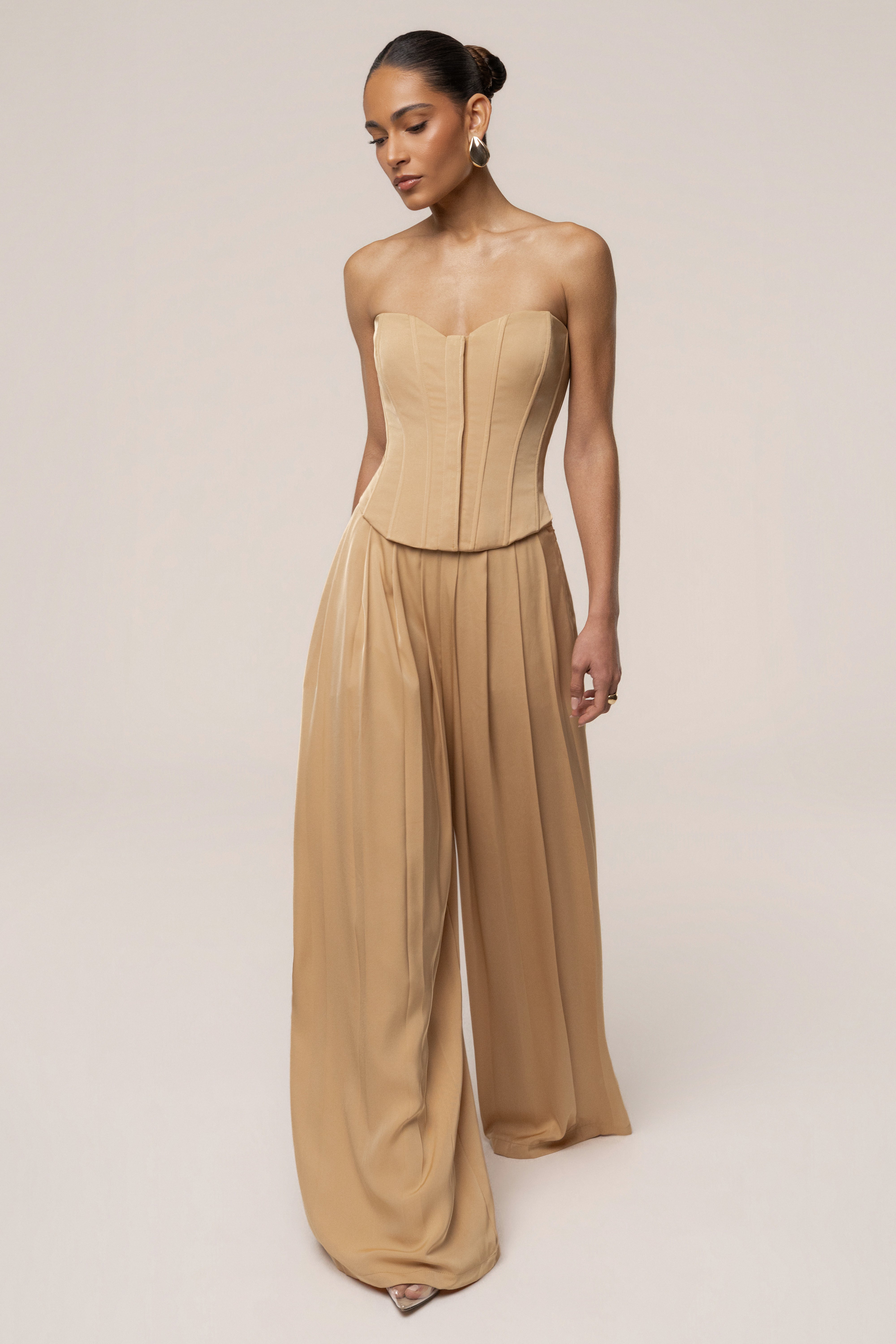 Beige Viv Satin Bustier Top by JLUXLABEL, shown in a close-up image highlighting the smooth satin fabric and fitted design.