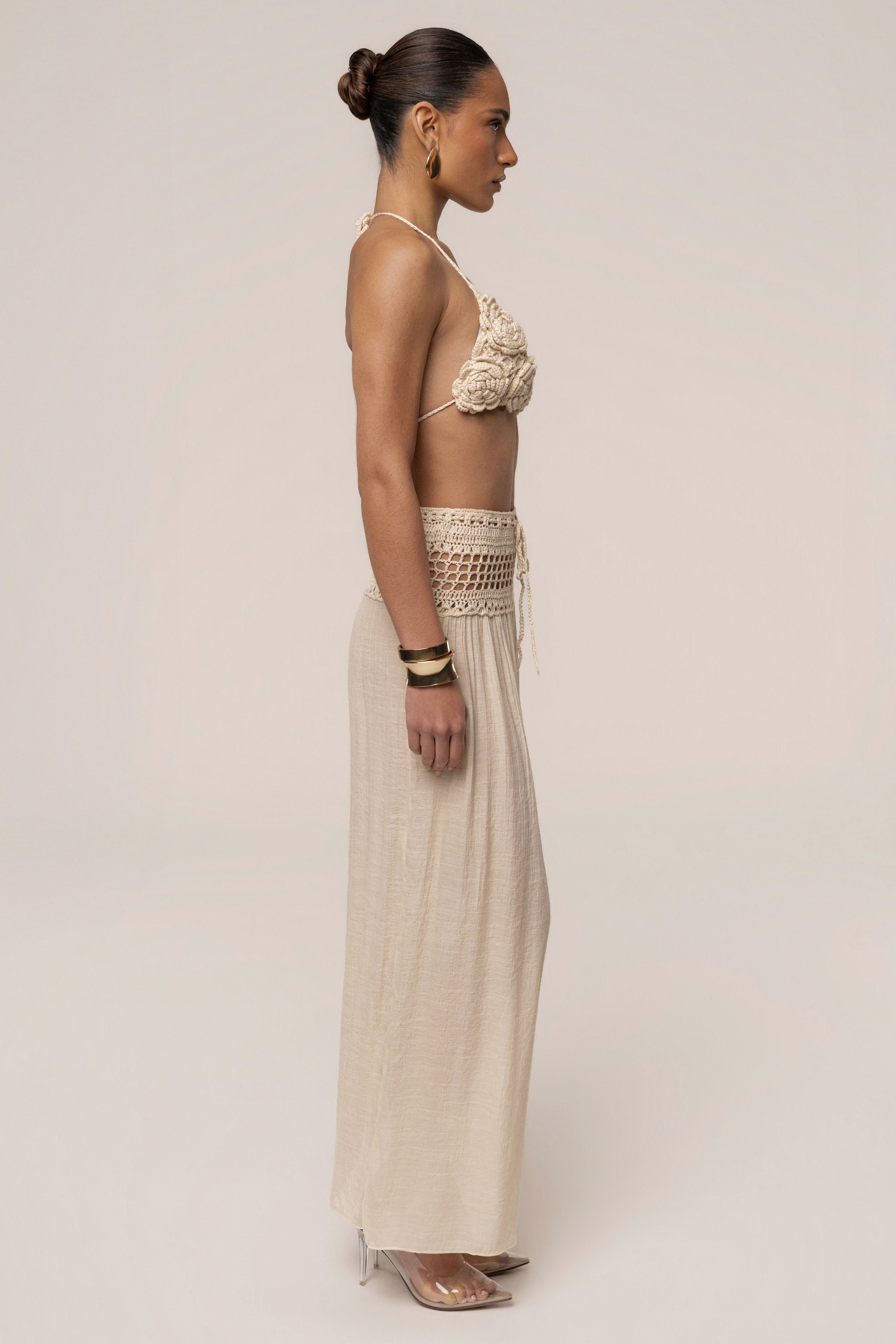 Beige crochet maxi skirt by JLUXLABEL featuring resort style, flowy design, and intricate crochet detailing.