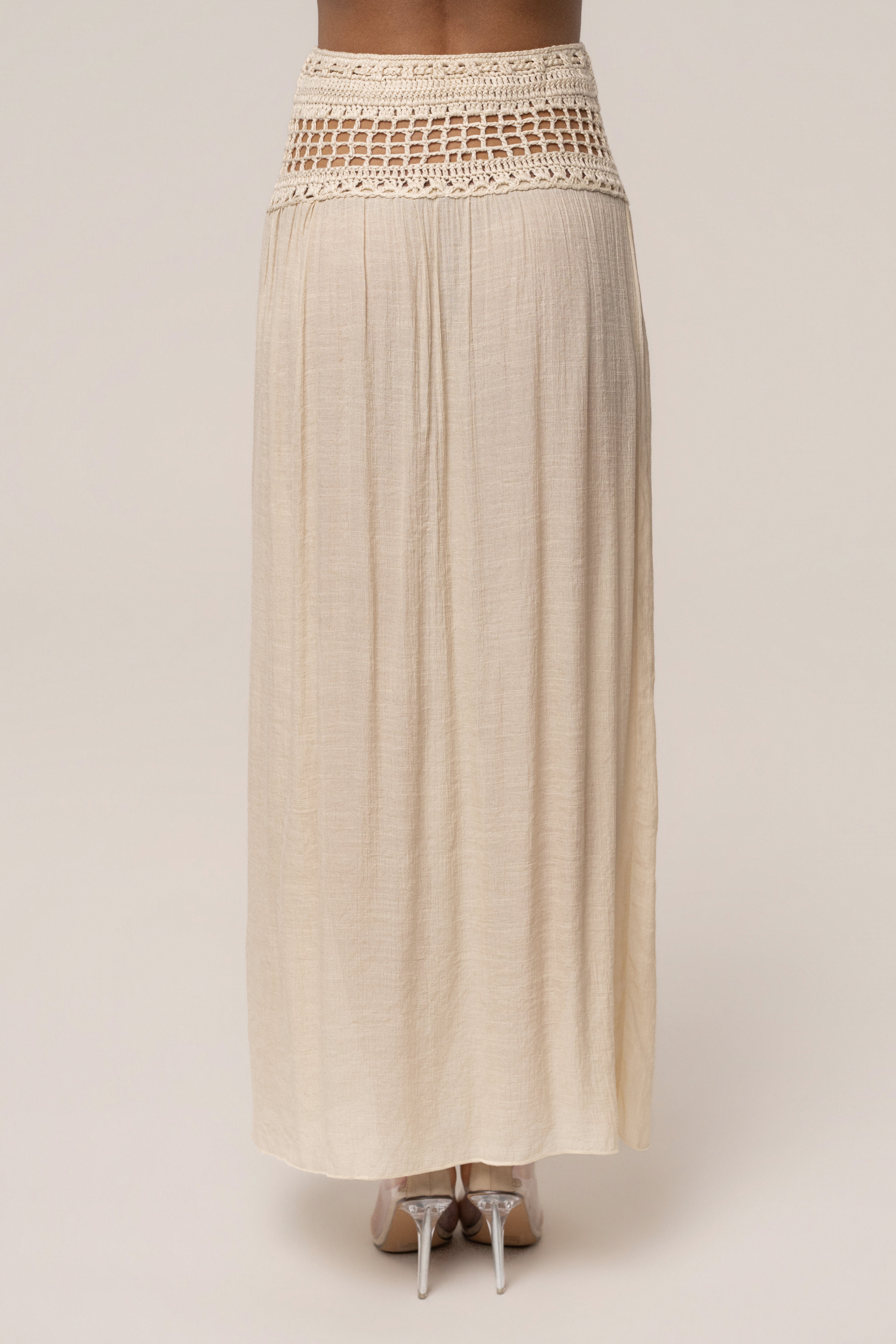 Beige crochet maxi skirt from JLUXLABEL featuring a flowy resort style, perfect for warm-weather and casual occasions.