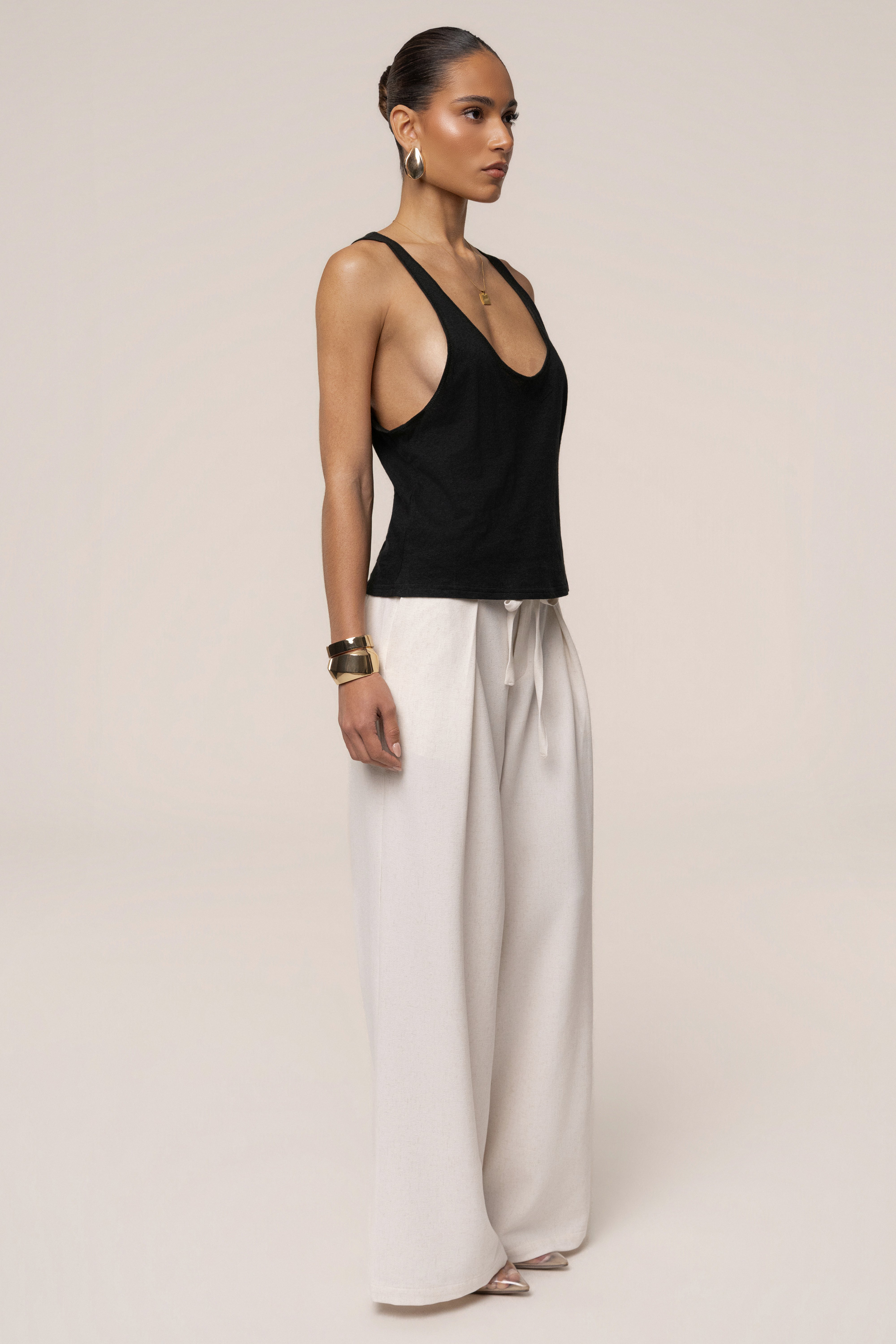 Ivory JLUXLABEL Refined Ease Wide Leg Pants shown flat with smooth fabric and wide-leg design for a stylish, comfortable look.