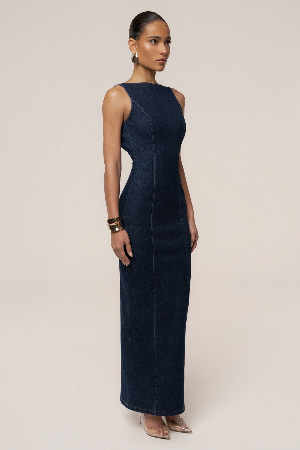 Dark denim sculpt maxi dress by JLUXLABEL, featuring a fitted silhouette and flowing length, perfect for stylish occasions.